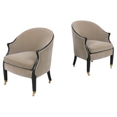 Pair of Lounge Chairs by Baker
