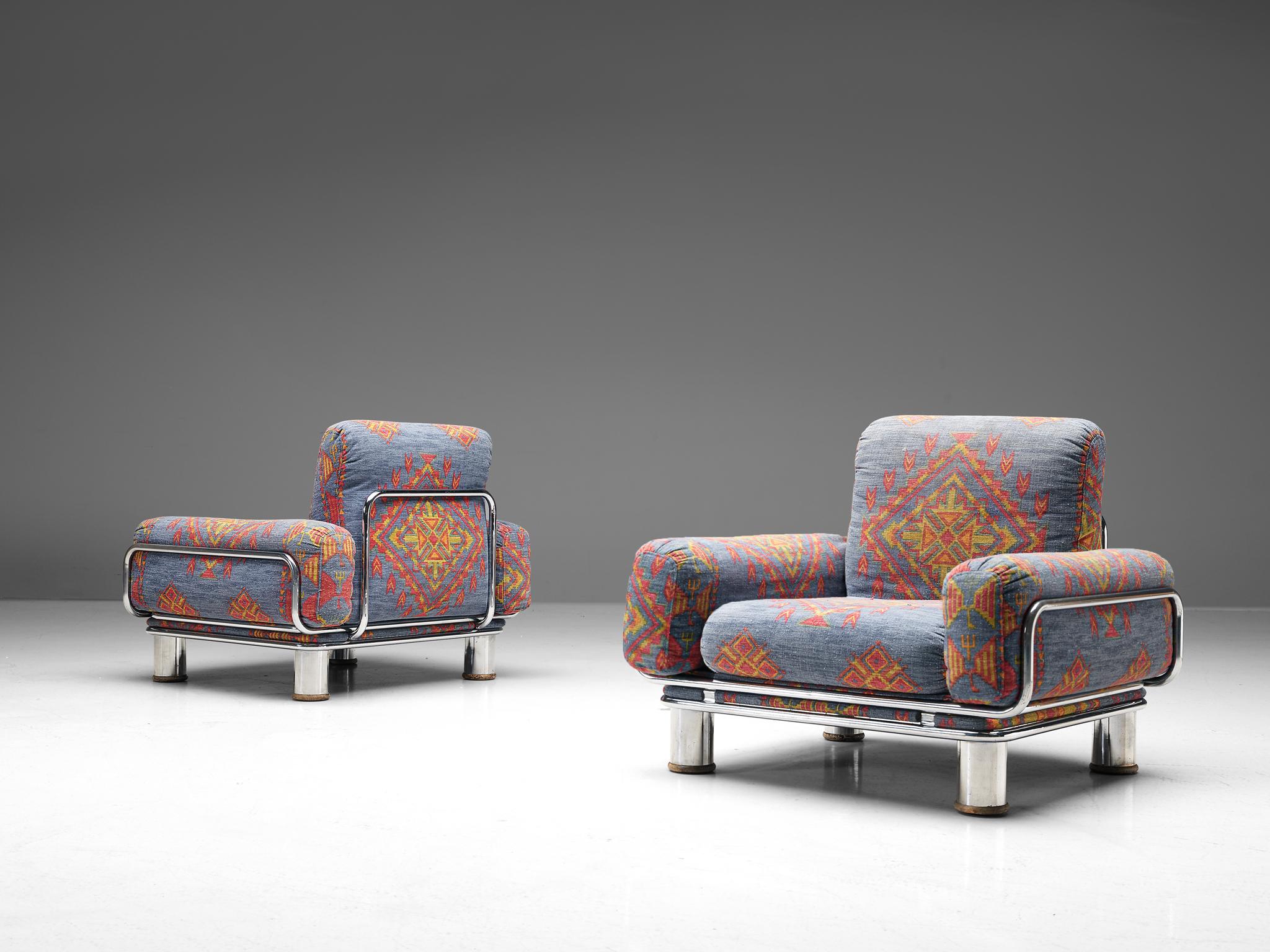 Gianfranco Frattini, pair of lounge chairs, fabric and chromed metal, Italy, 1970s

A Postmodern set of two easy chairs that features bulky shapes. A tubular chromes steel frame forms the base of the sofa. It holds the comfortable and thick