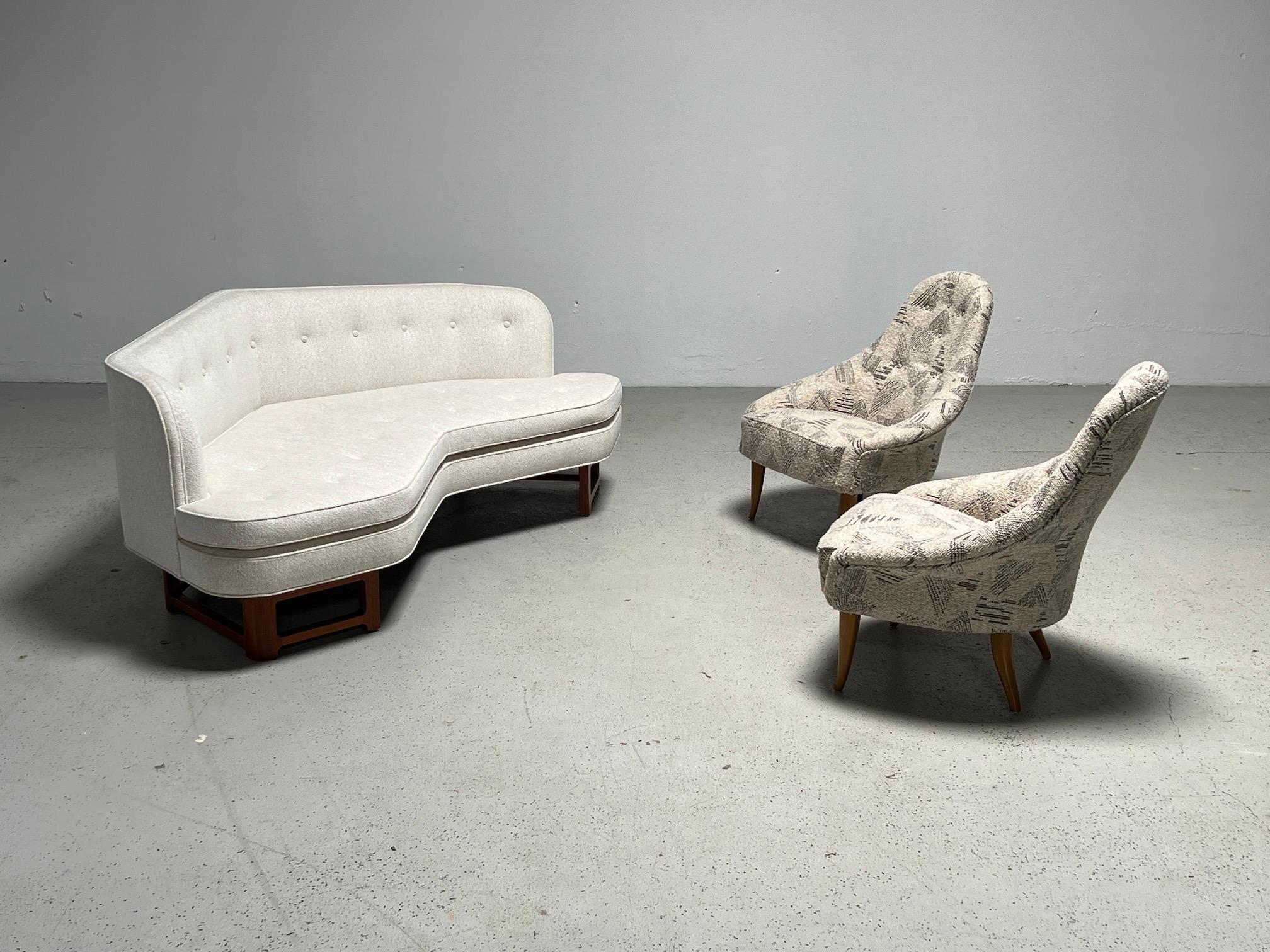 Pair of diminutive lounge chairs designed by Kerstin Ho¨rlin-Holmquist for Nordiska Kompaniet. Fully restored and upholstered in Holly Hunt / Facet / Pewter fabric.