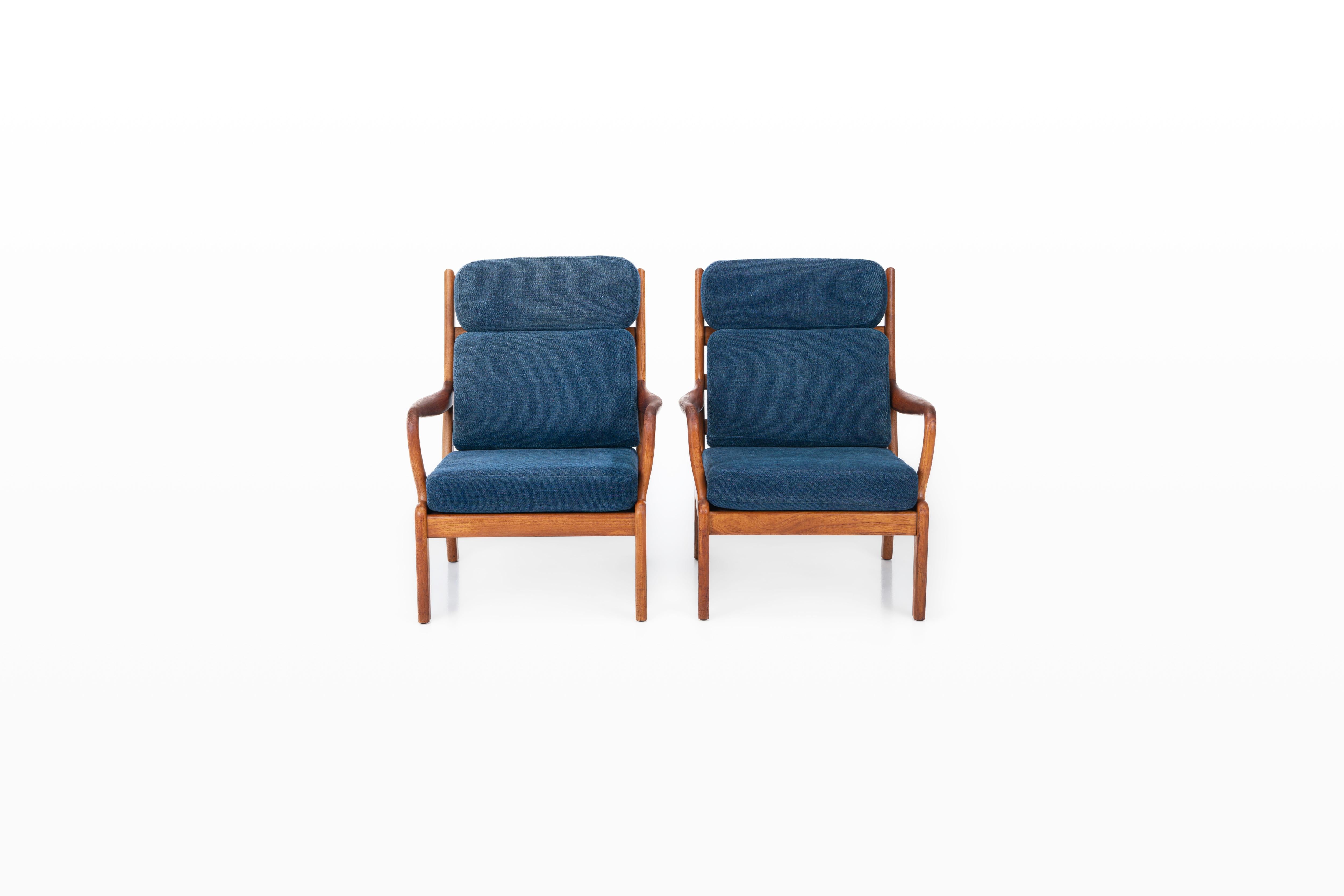 Set of two Scandinavian lounge chairs by L. Olsen & Søn, Denmark 1960s. These lounge chairs have a teak frame, blue upholstery and are in very good condition. The chairs are marked by the producer.

Dimensions:
W: 74 cm
D: 83 cm
H: 99 cm
