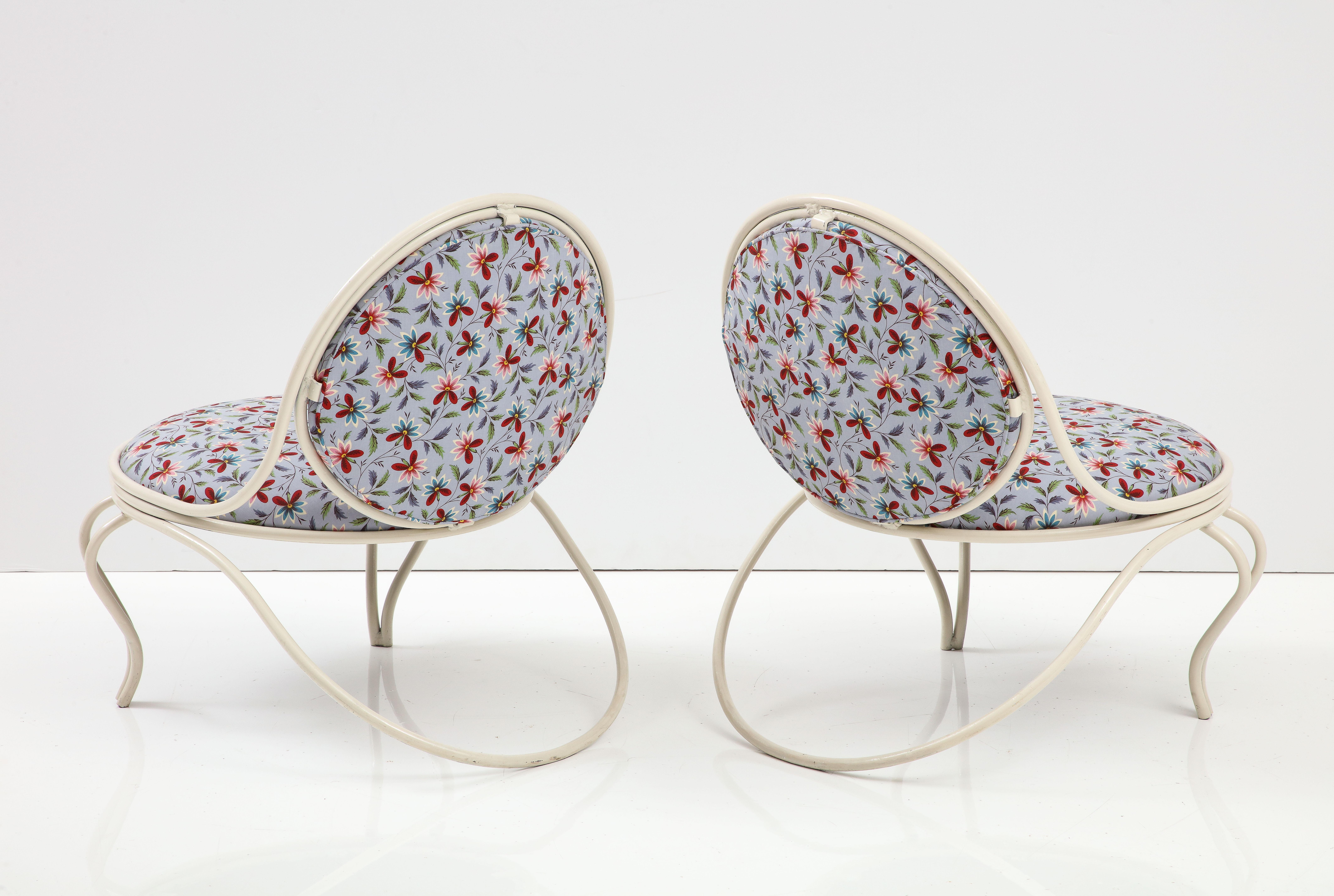 Pair of lounge chairs by Mathieu Matégot, France, mid-20th century. 

Newly Reupholstered in a Playful Floral Print from John Rosselli.