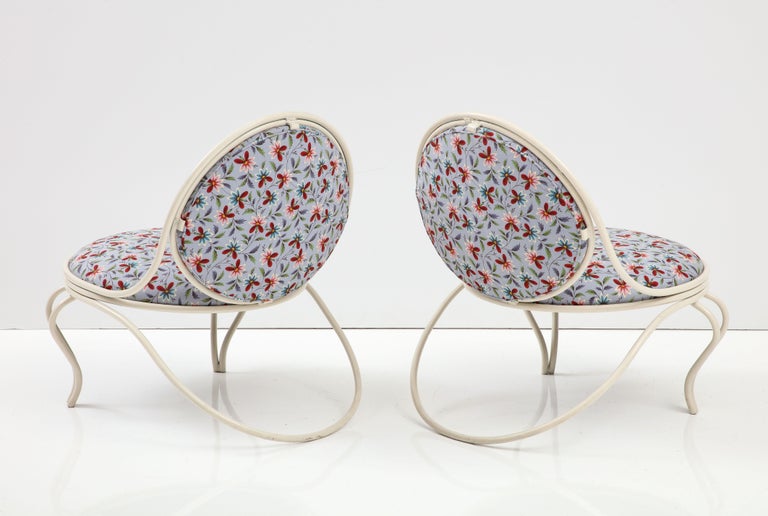 Pair of lounge chairs by Mathieu Matégot, France, mid-20th century. 

Newly Reupholstered in a Playful Floral Print from John Rosselli.