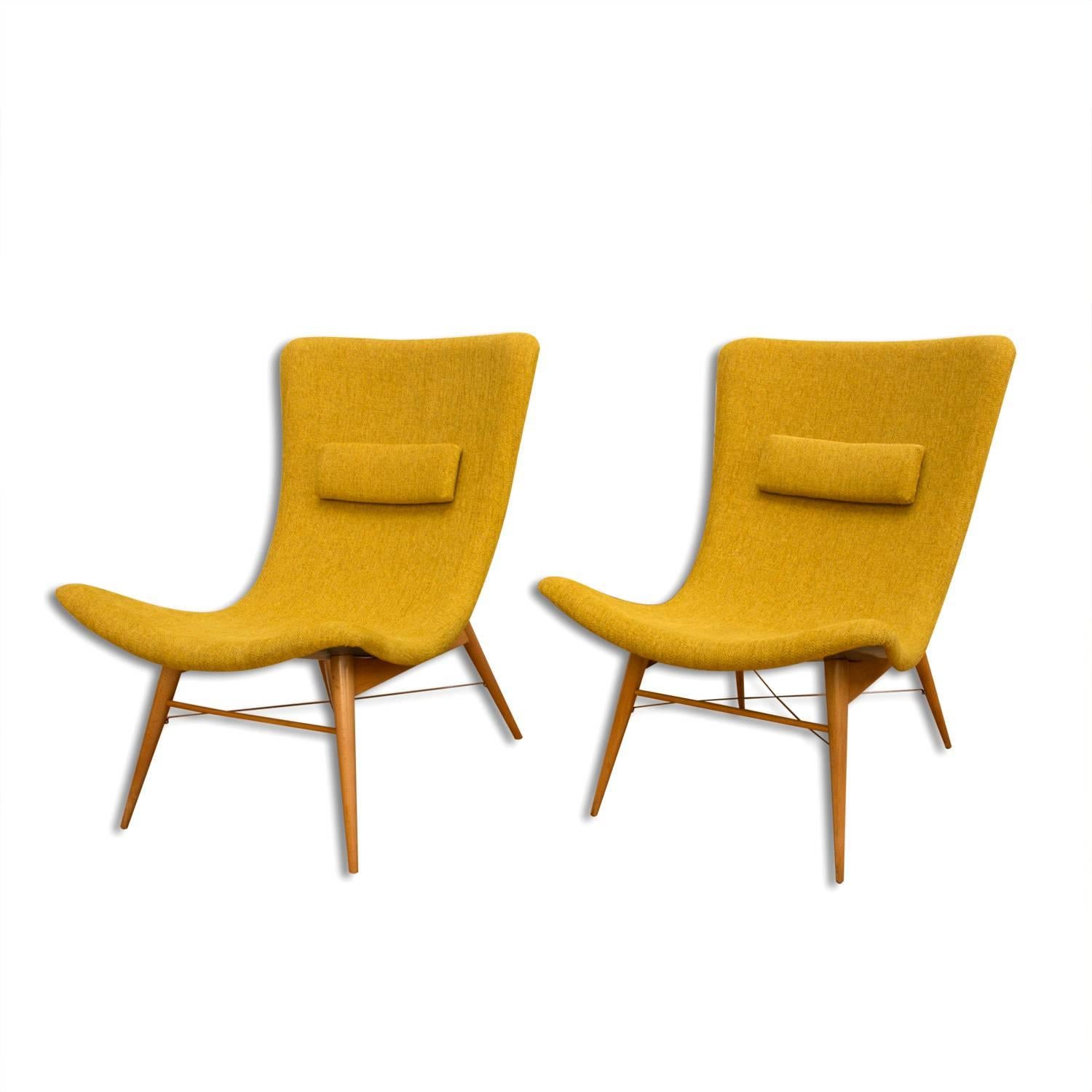 This pair of simple lounge chairs was designed in 1959 by Miroslav Navratil and produced by Ceský Nábytek for the Trienalle in Milano. The seats are made of plastic laminate and have been professionally restored. They have been reupholstered and