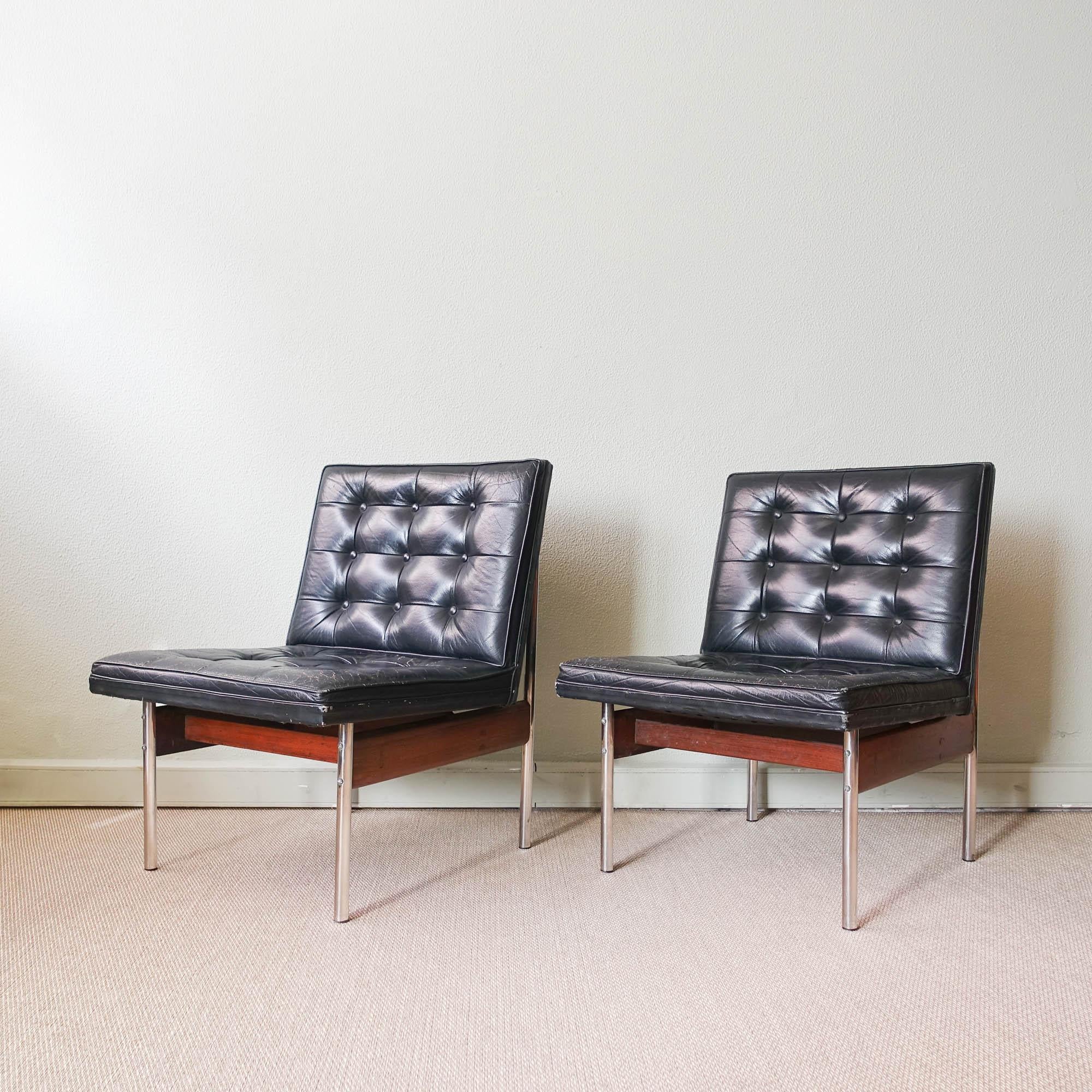 Step into the vibrant world of 1970s Brazilian design with this exquisite pair of lounge chairs, crafted by Móveis Cimo. Each chair features a harmonious blend of exotic wood and sleek chromed metal, exuding understated elegance with its simple yet