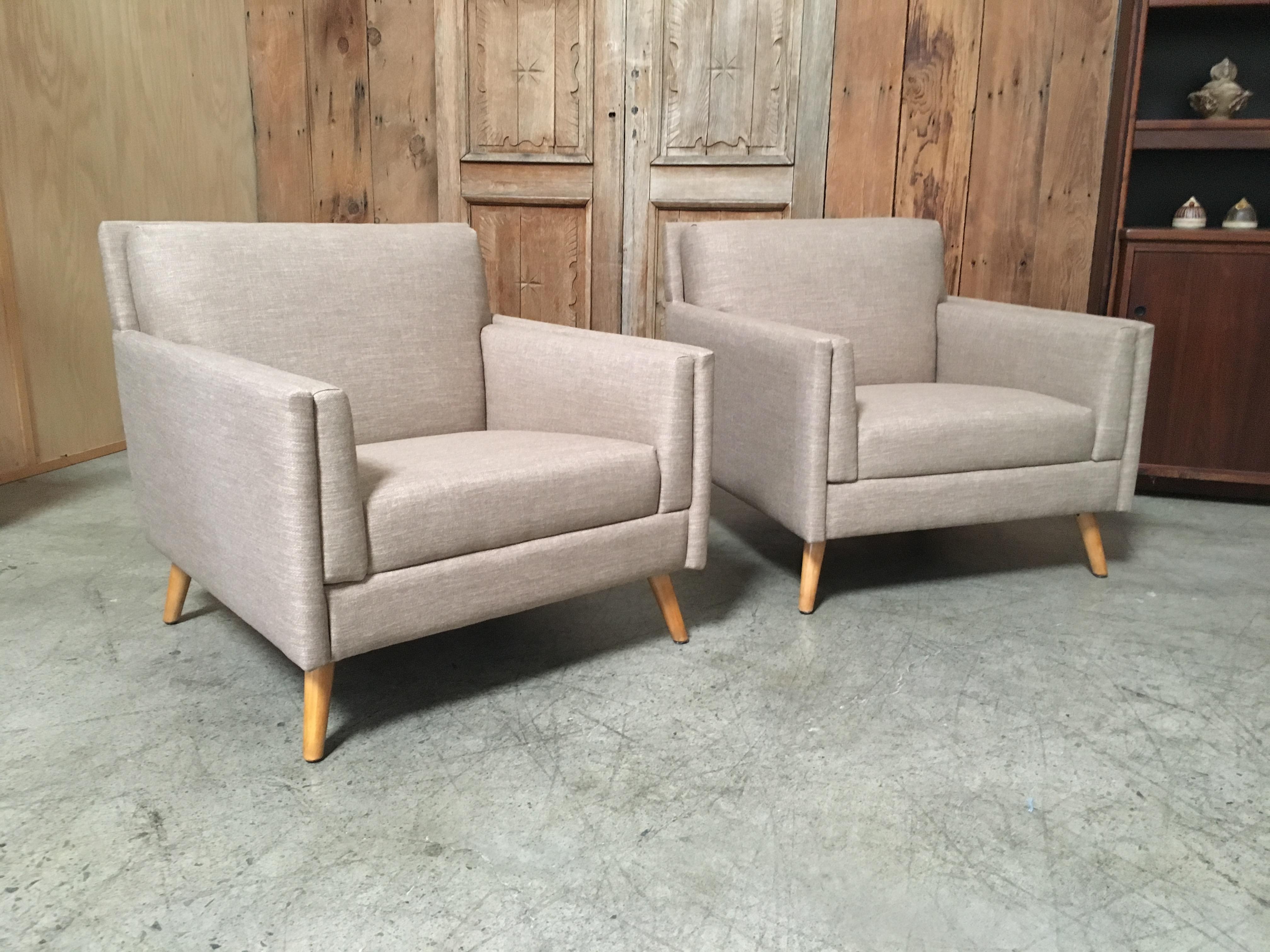 Paul McCobb for Planner Group very angular with sharp edges and sprawled maple legs and new upholstery.