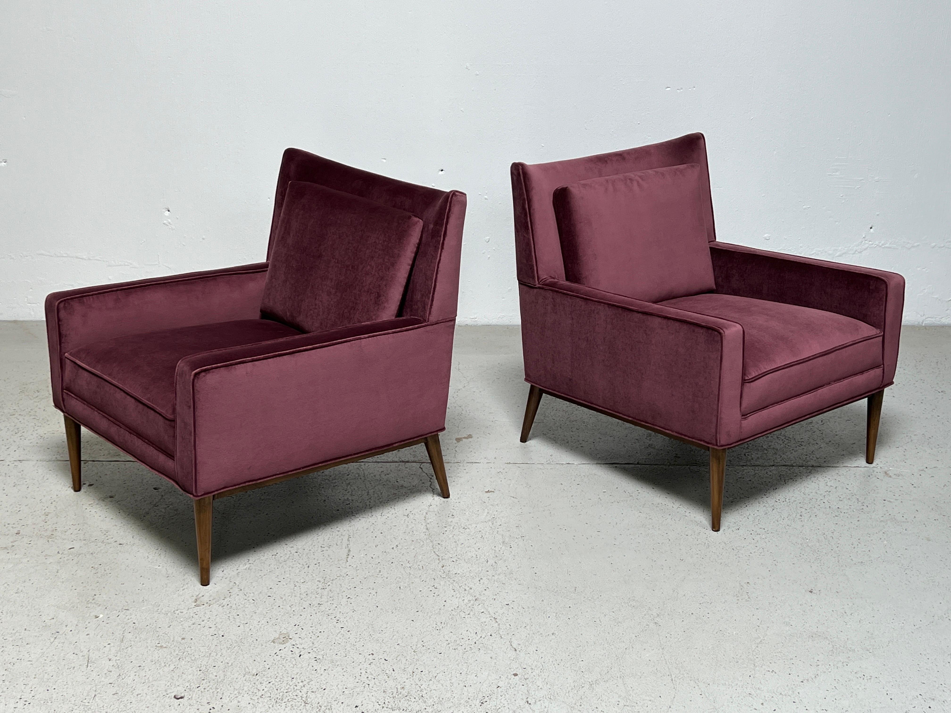 A pair of lounge chairs designed by Paul McCobb.