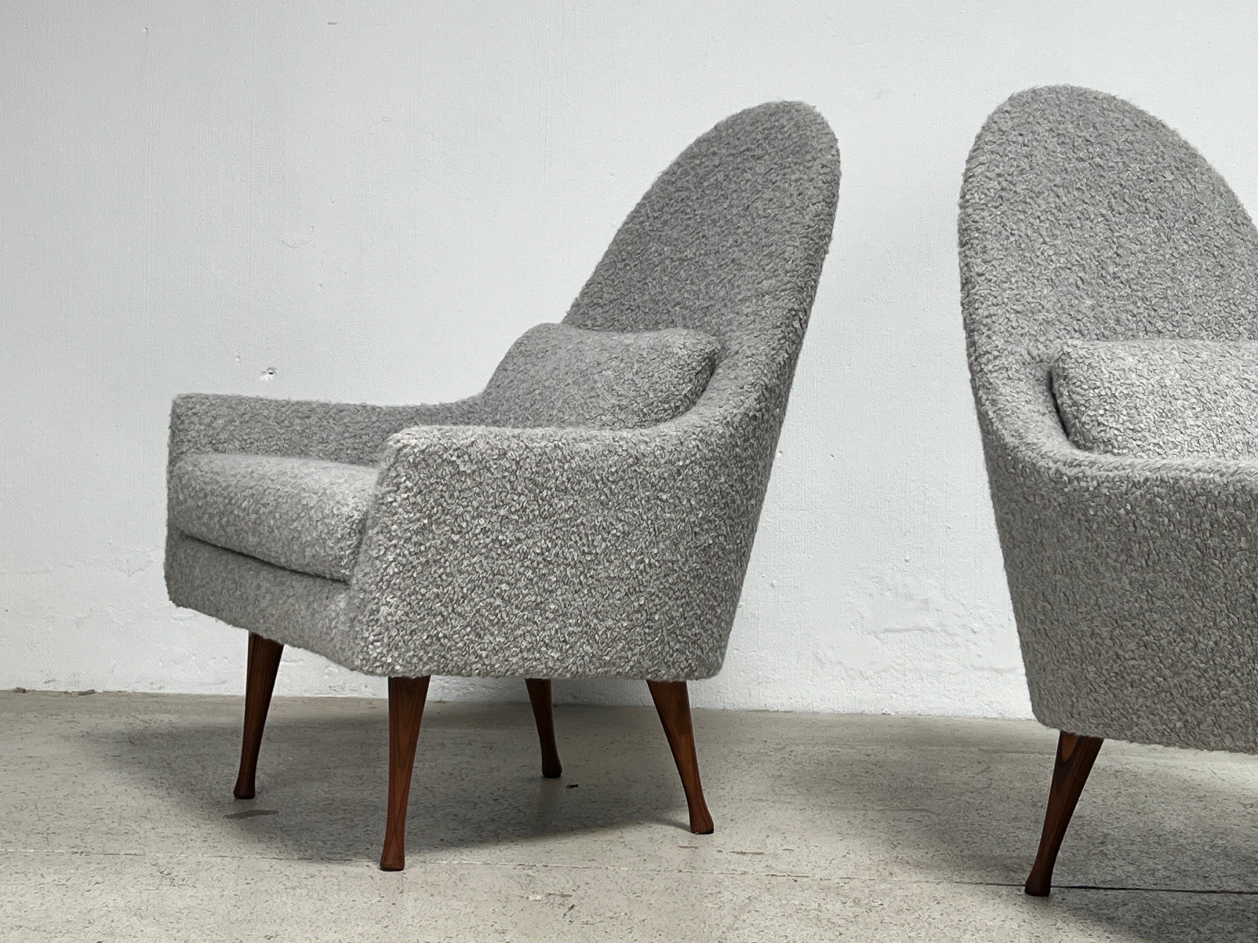 A pair of lounge chairs designed by Paul McCobb for Widdicomb in 1960-61. Fully restored and reupholstered in Holly Hunt / Teddy / Warm Silver fabric. 