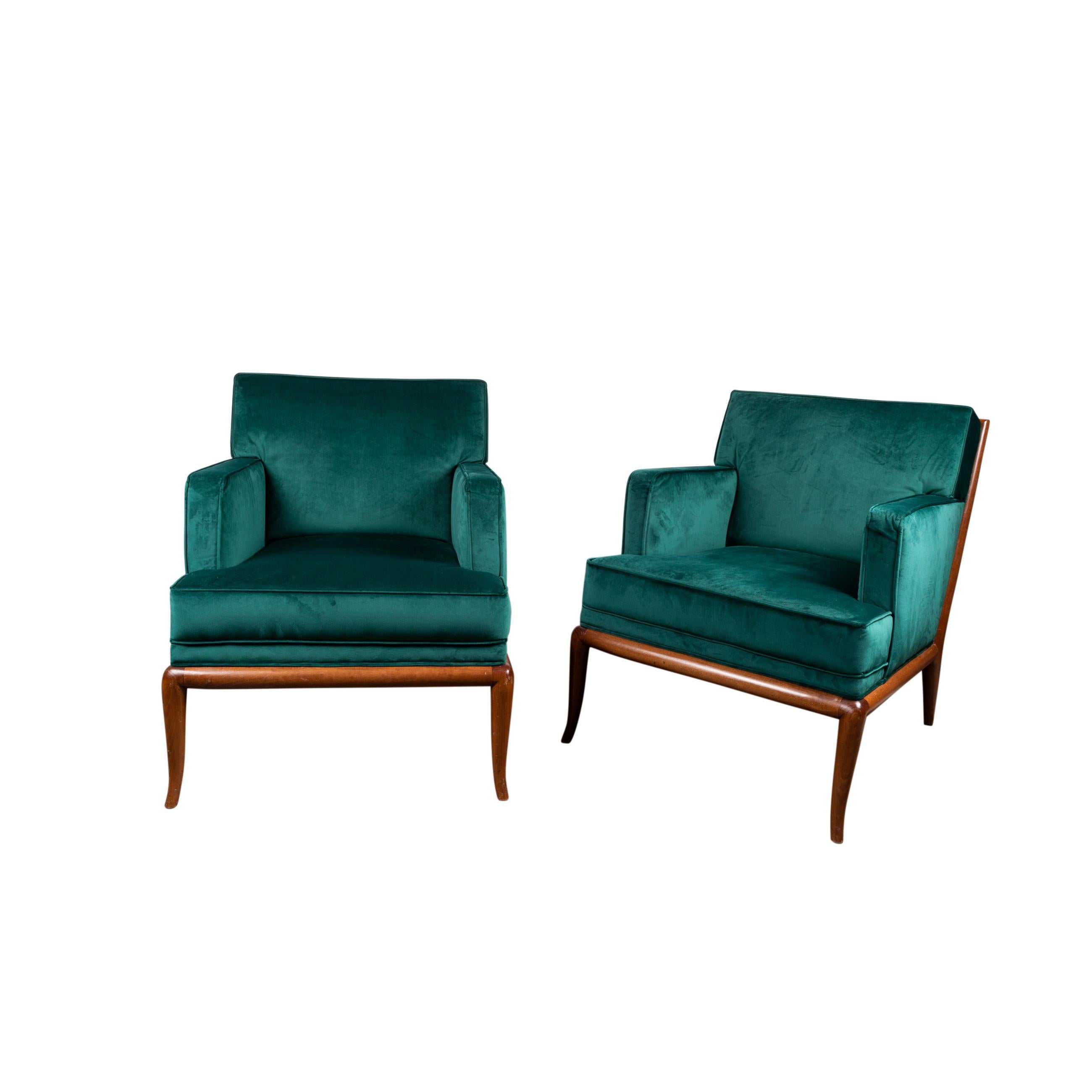 A pair of walnut lounge chairs designed by T.H. Robsjohn-Gibbings for Widdicomb.
 Reupholstered in emerald green velvet .
United States 
1950's

Terence Harold Robsjohn-Gibbings is a British-born architect, decorator, furniture designer,