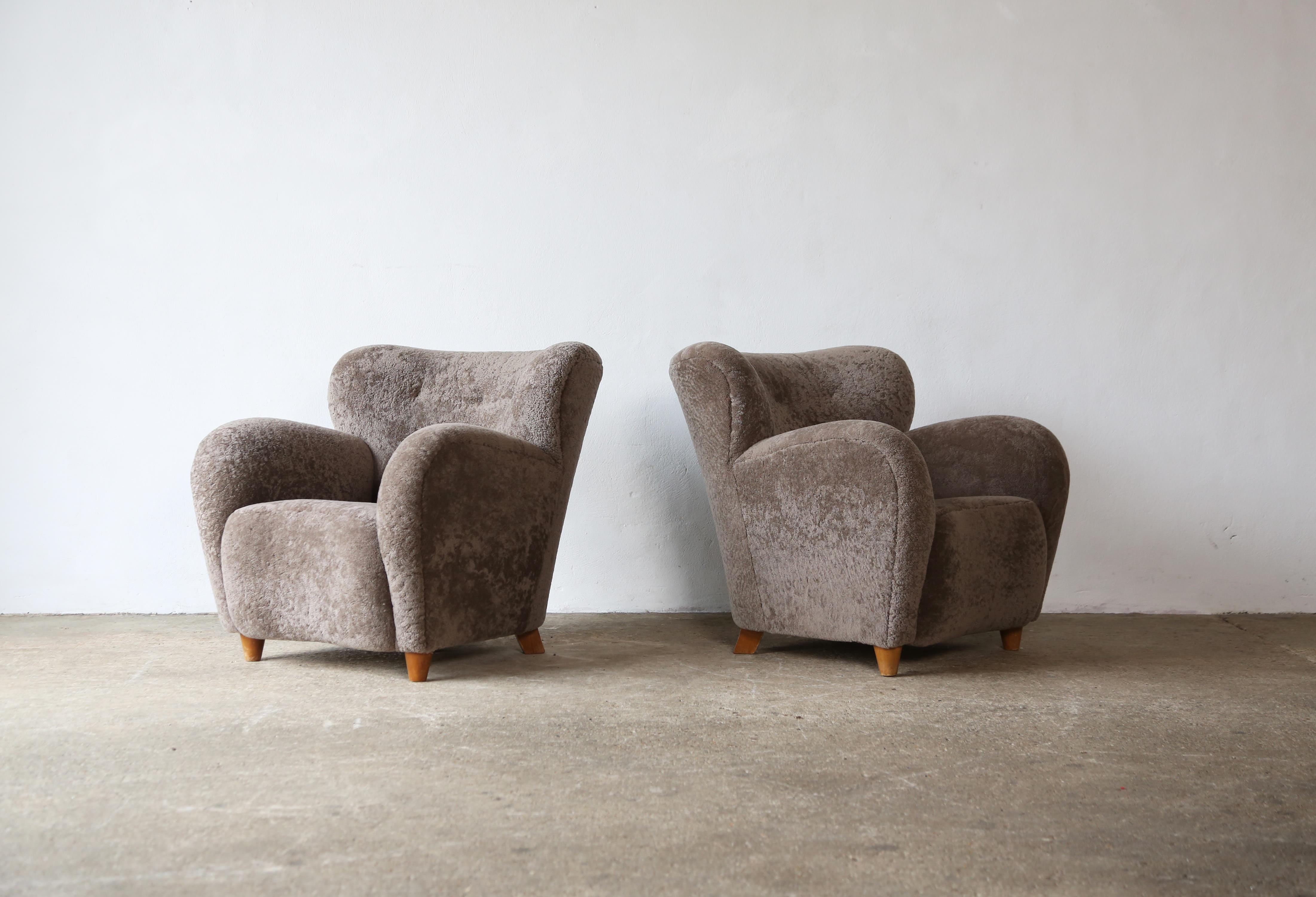 Danish Pair of Lounge Chairs, Denmark, 1950s, Newly Upholstered in Sheepskin For Sale