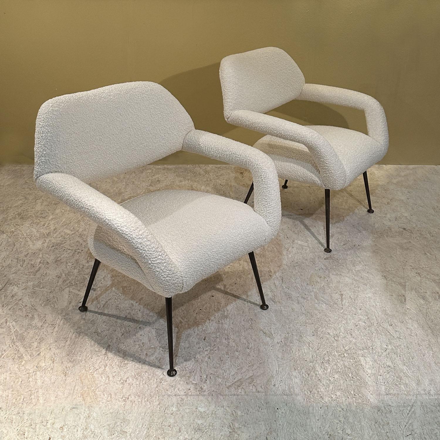 Original pair of Lounge chairs Gastone Rinaldi Italy 1954, model DU 55, organically shaped with curvaceous contours and ergonomic shapes. Rare U-back lounge chair, produced by RIMA, Italy. The shape of the armchairs is sculptural, unique, and