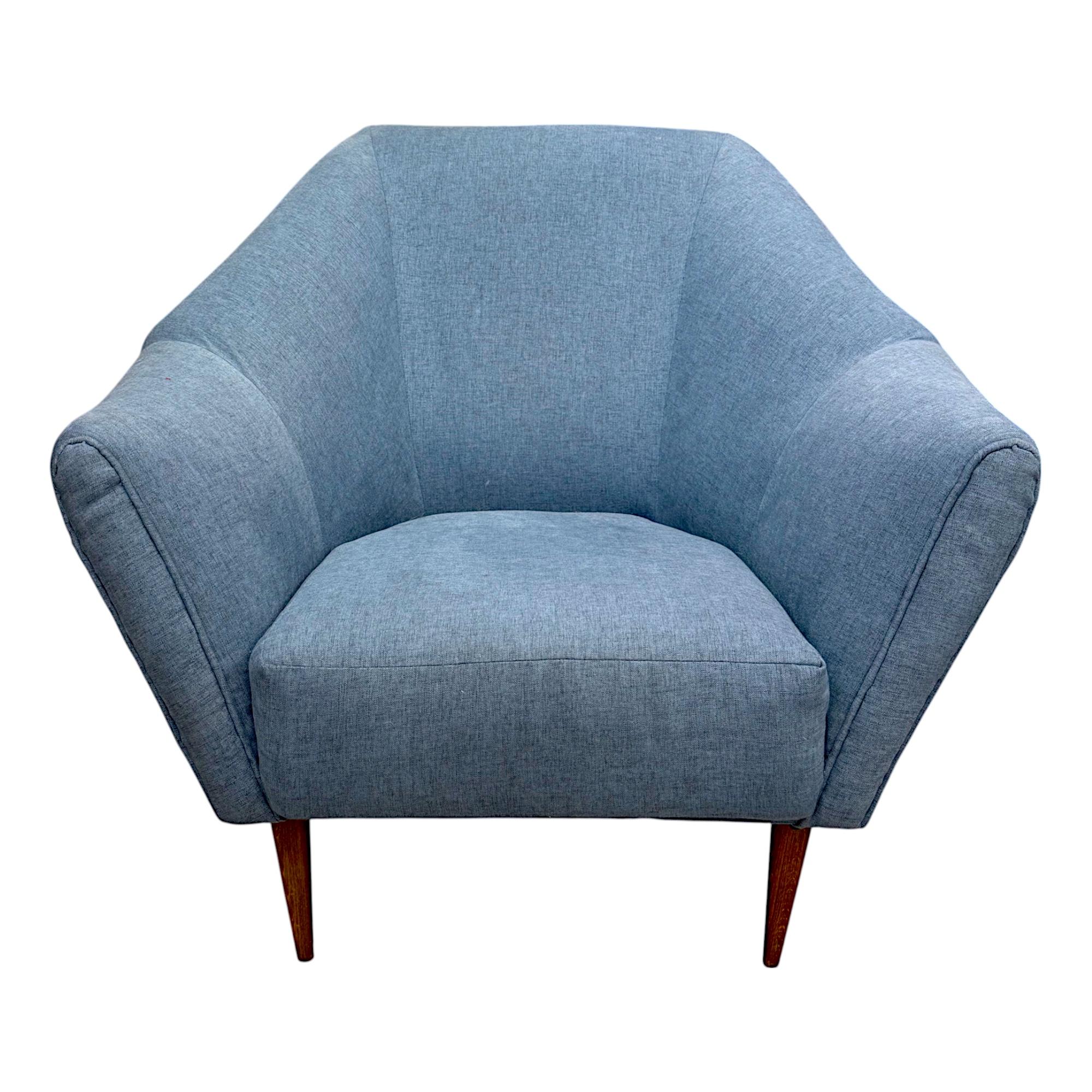 An iconic pair of mid-century lounge chairs designed by the designer Ico Parisi for Ariberto Colombo, crafted in Italy during the 1950s. These sculptural chairs exemplify Parisi’s masterful fusion of modernist lines and organic forms, showcasing a