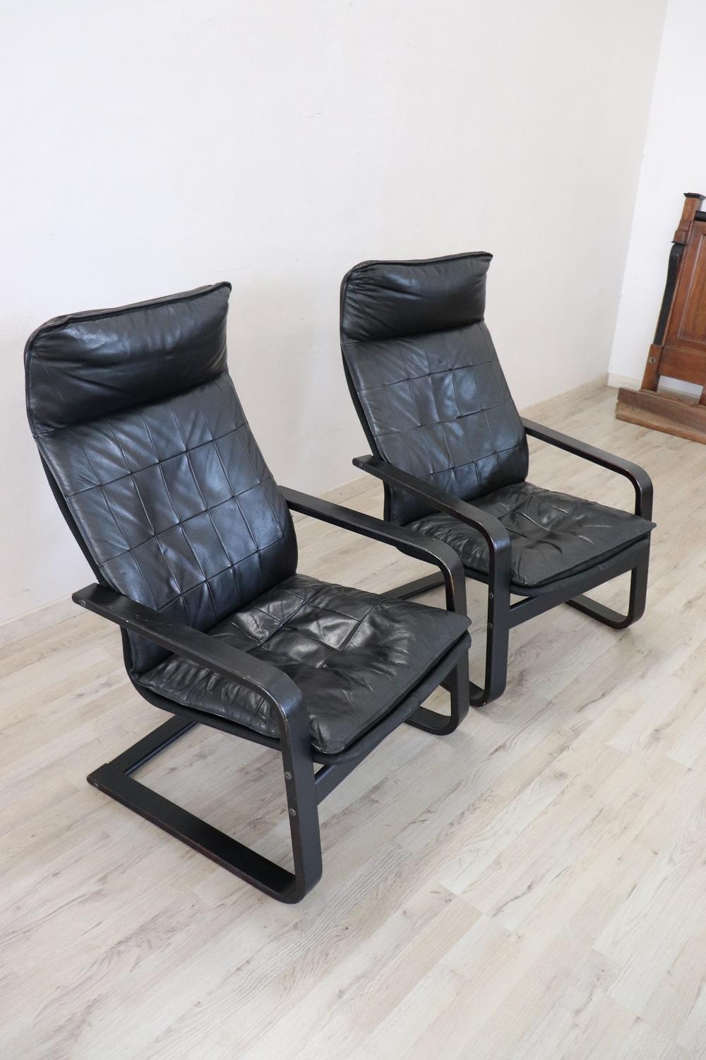 Italian Pair of Lounge Chairs in Black Leather, 1970s For Sale
