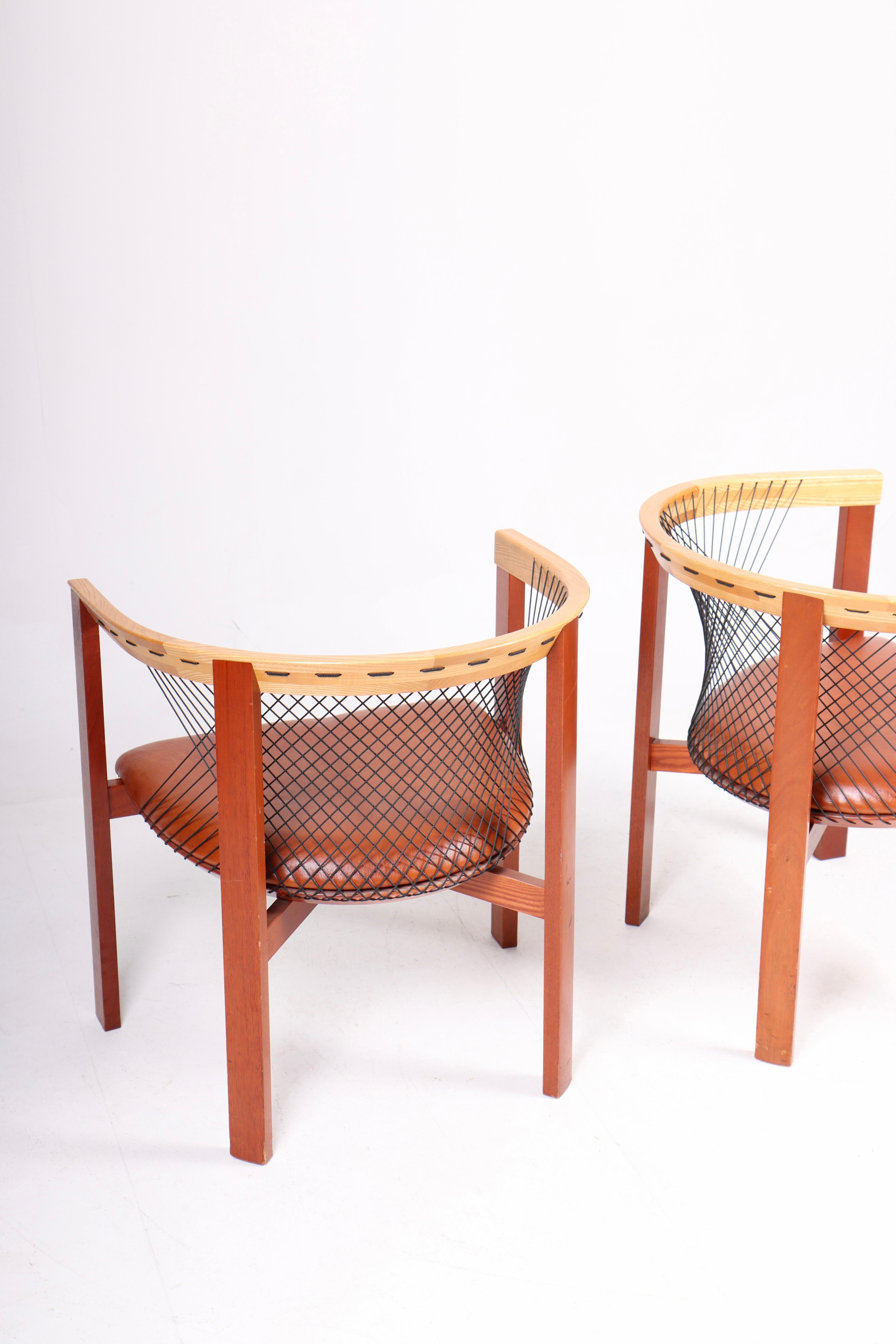 Pair of Lounge Chairs in Elm and Patinated Leather by Niels Jørgen Haugesen 2