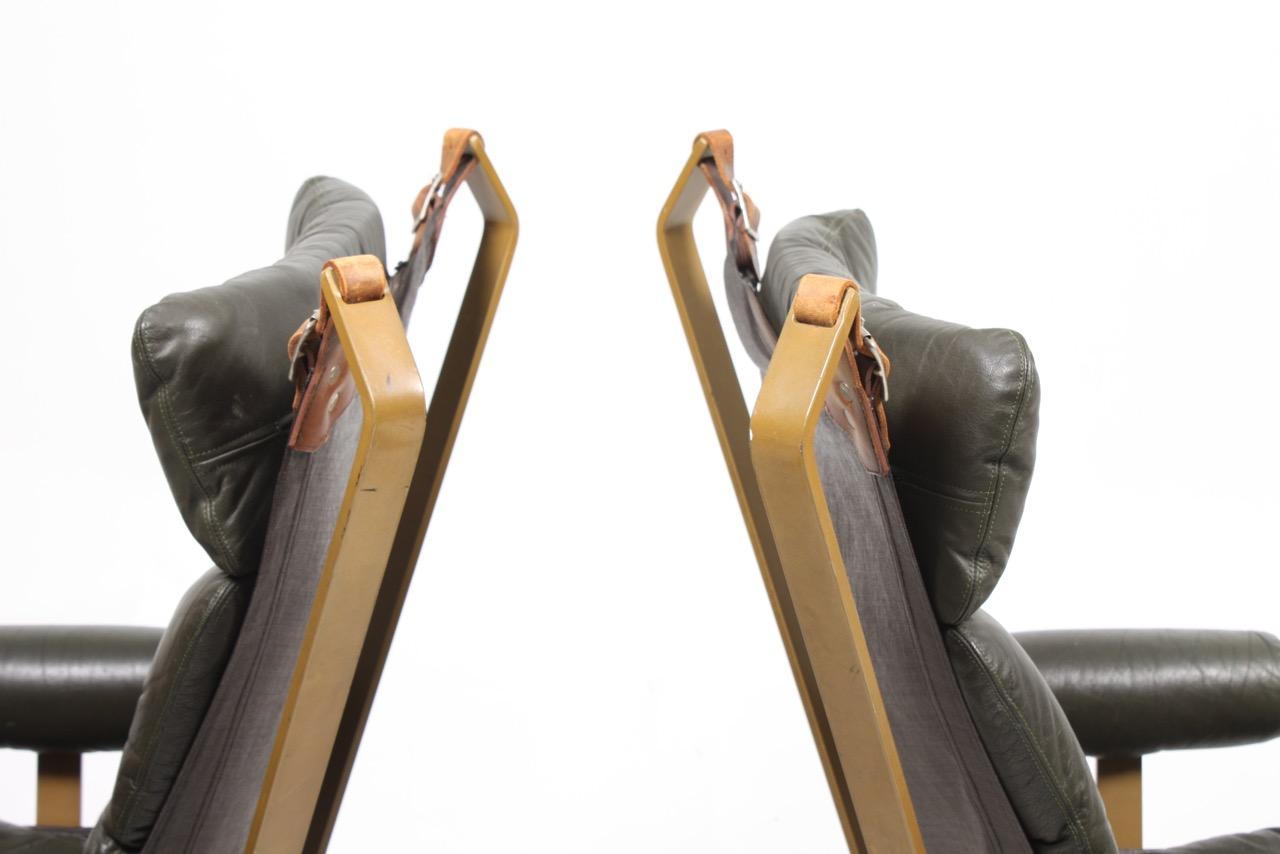 Metal Pair of Lounge Chairs in Leather