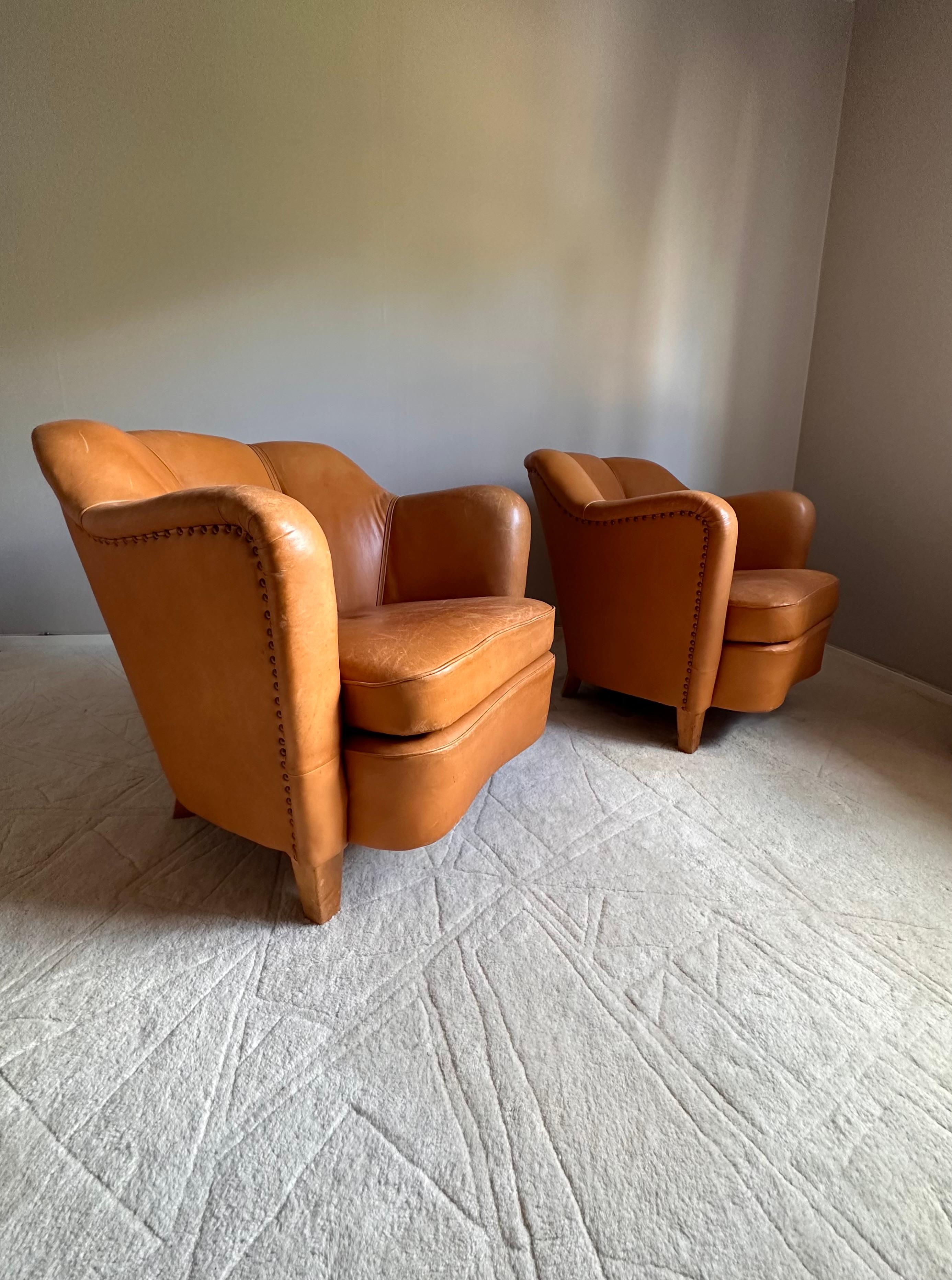 Leather Easy chairs, upholstered in leather,  Scandinavian -50s
