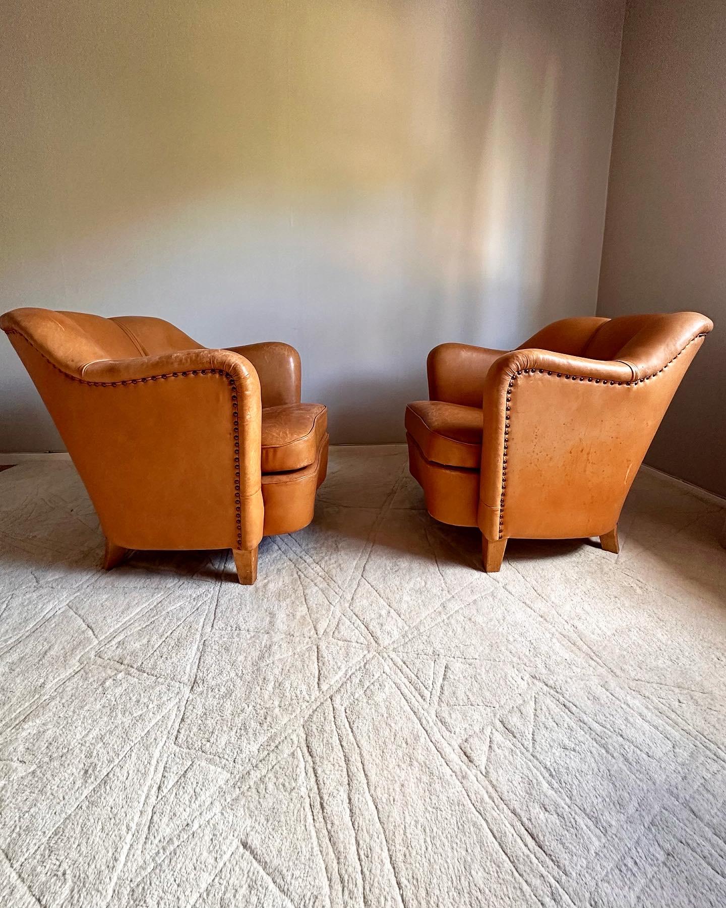 Easy chairs, upholstered in leather,  Scandinavian -50s 1