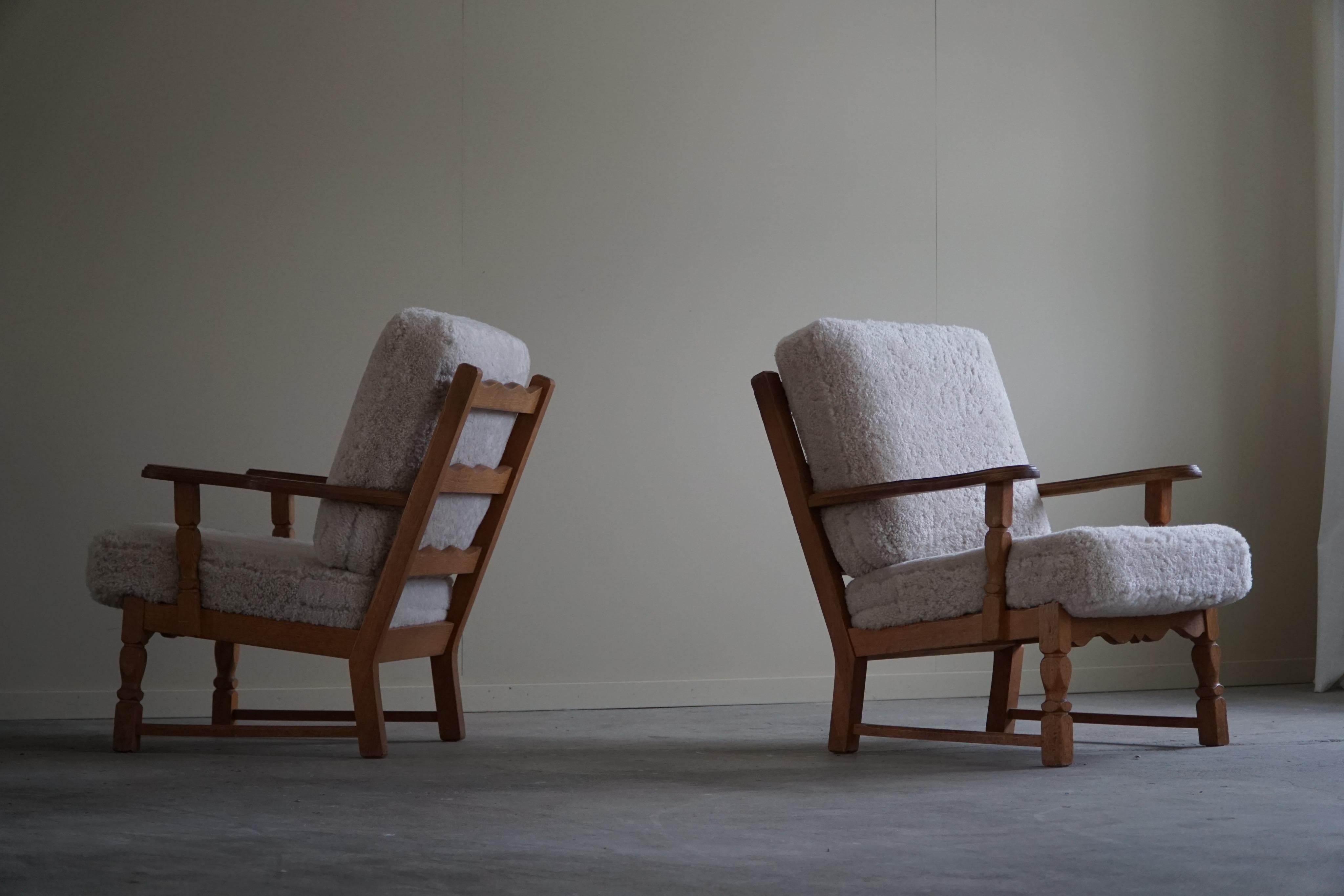 Pair of Lounge Chairs in Oak and Lambswool, Henning Kjærnulf Style, 1960s In Good Condition In Odense, DK