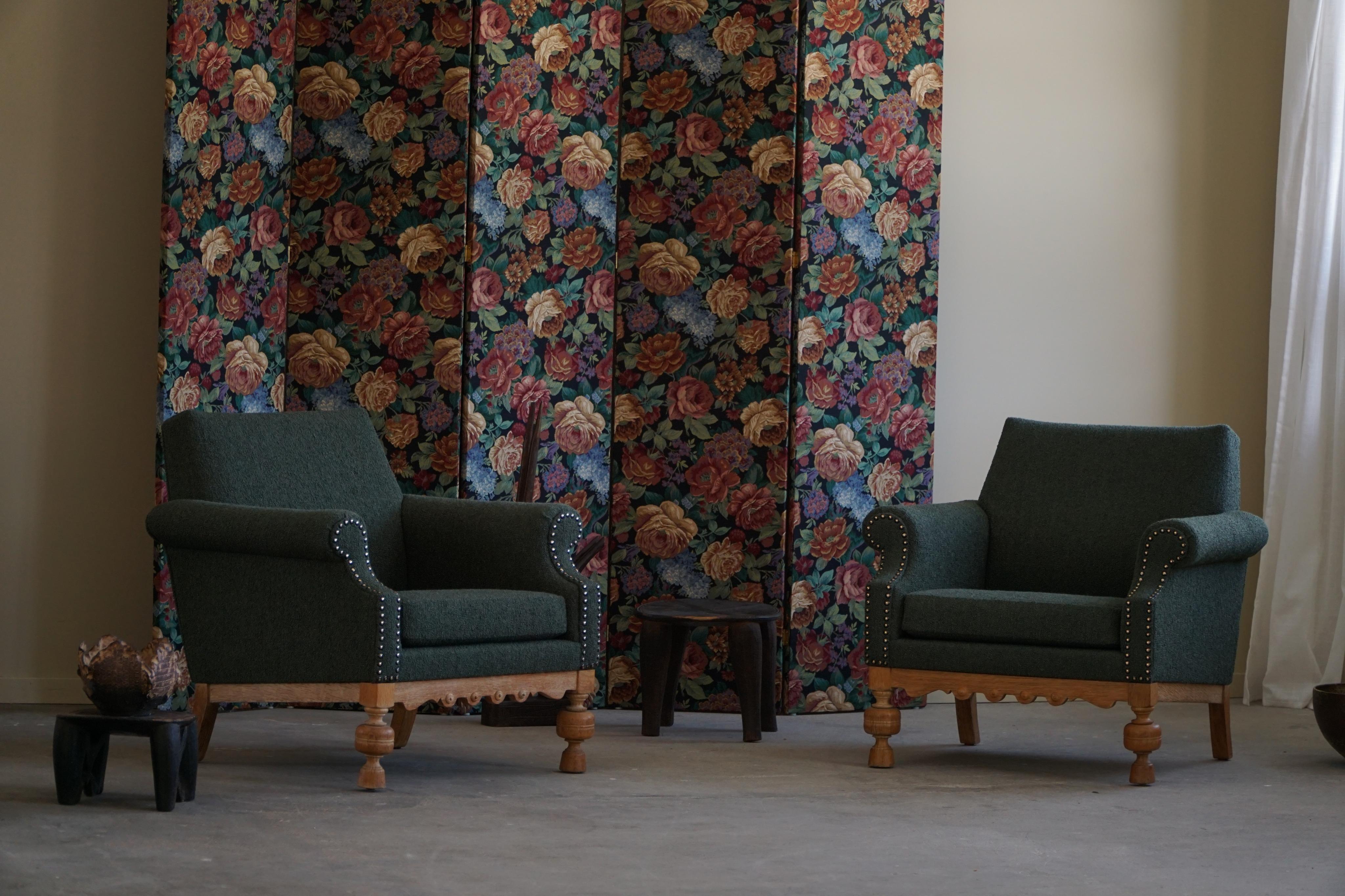 Embrace the timeless elegance of Danish Mid-Century Modern design with this exquisite pair of lounge chairs, crafted in the 1950s by a skillful carpenter. Expertly constructed from solid oak, the chairs feature gracefully turned legs. The warm and