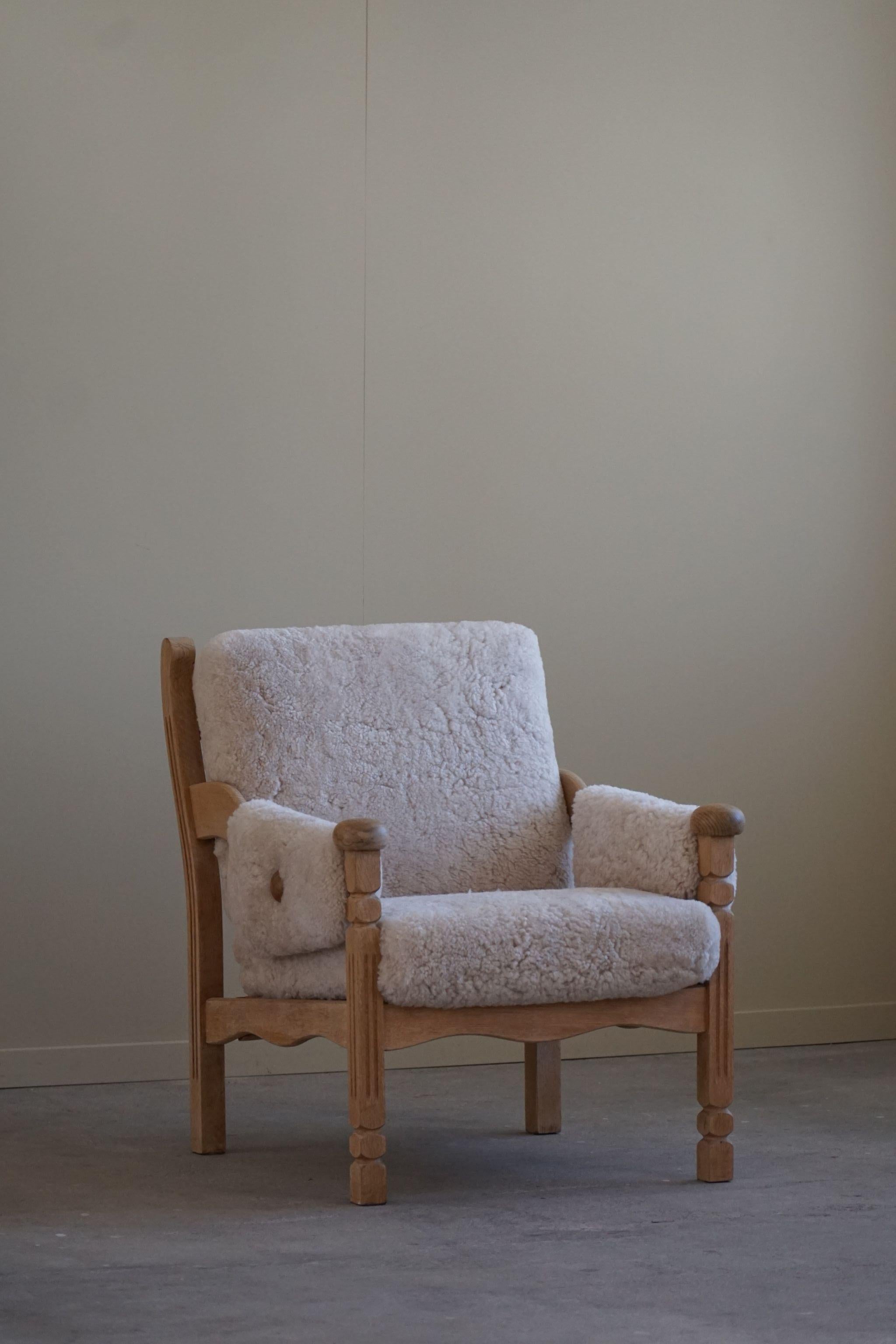 Pair of Lounge Chairs in Oak & Lambswool, Danish Modern, Henning Kjærnulf, 1960 In Good Condition In Odense, DK