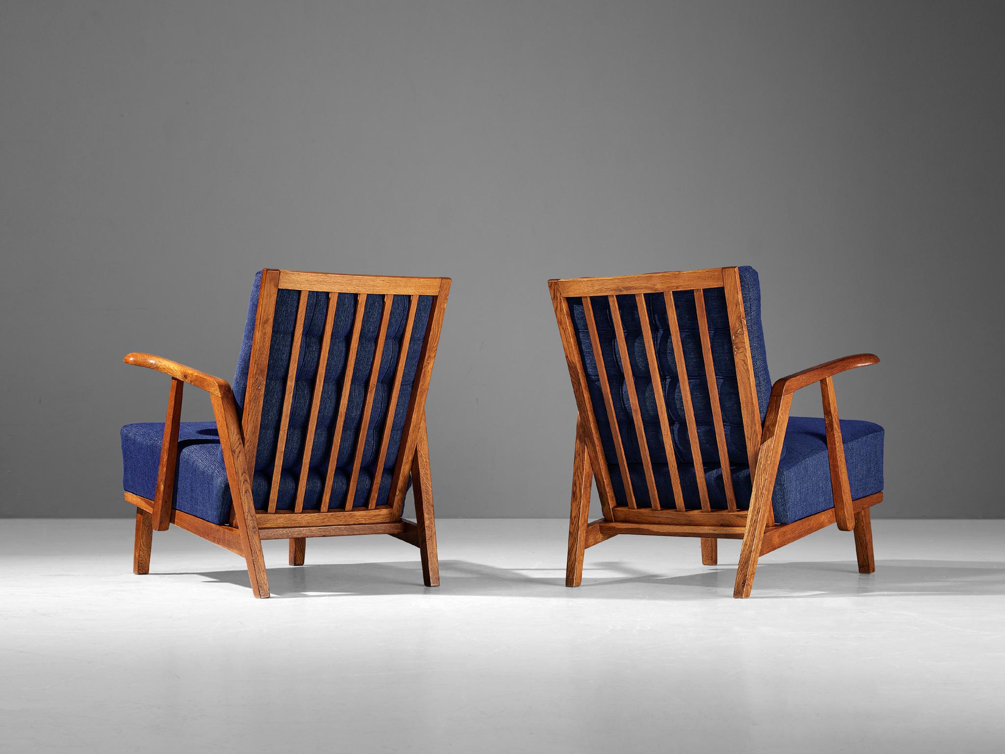 Mid-20th Century Pair of Lounge Chairs in Oak With Slatted Backs in Dark Blue Upholstery For Sale