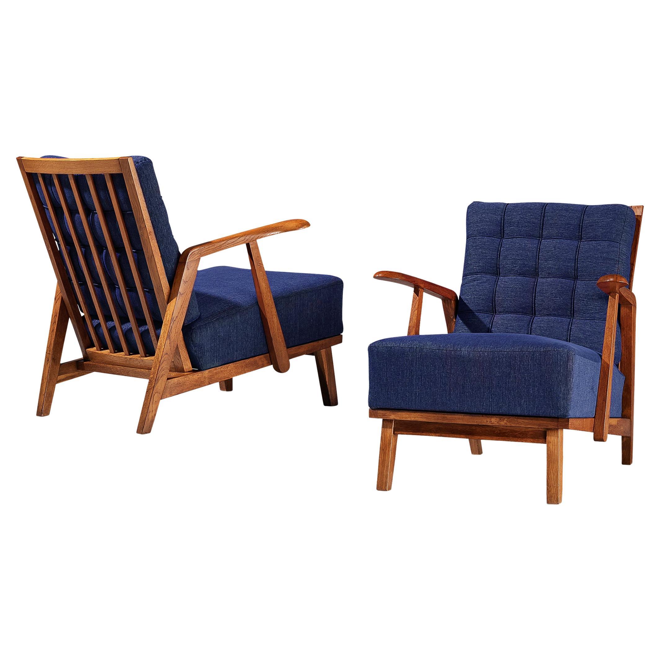 Pair of Lounge Chairs in Oak With Slatted Backs in Dark Blue Upholstery  For Sale