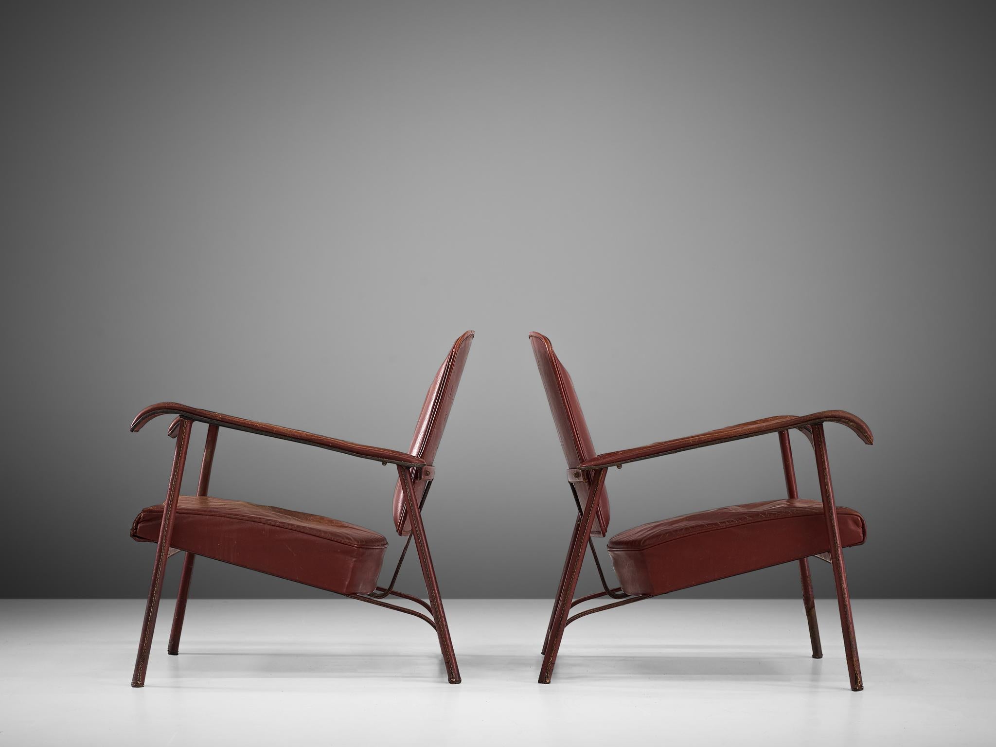 Pair of Lounge Chairs in Patinated Burgundy Leather by Jacques Adnet In Good Condition In Waalwijk, NL