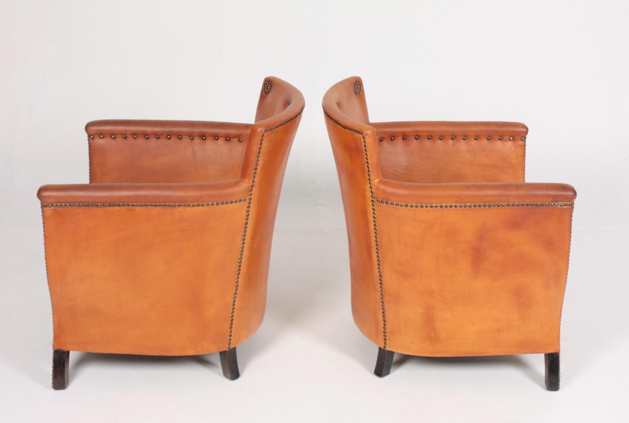 Pair of Lounge Chairs in Patinated Leather and Boucle Designed by Otto Schulz 4