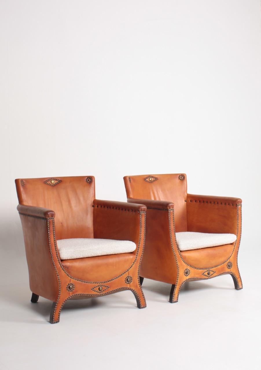 Brass Pair of Lounge Chairs in Patinated Leather and Boucle Designed by Otto Schulz