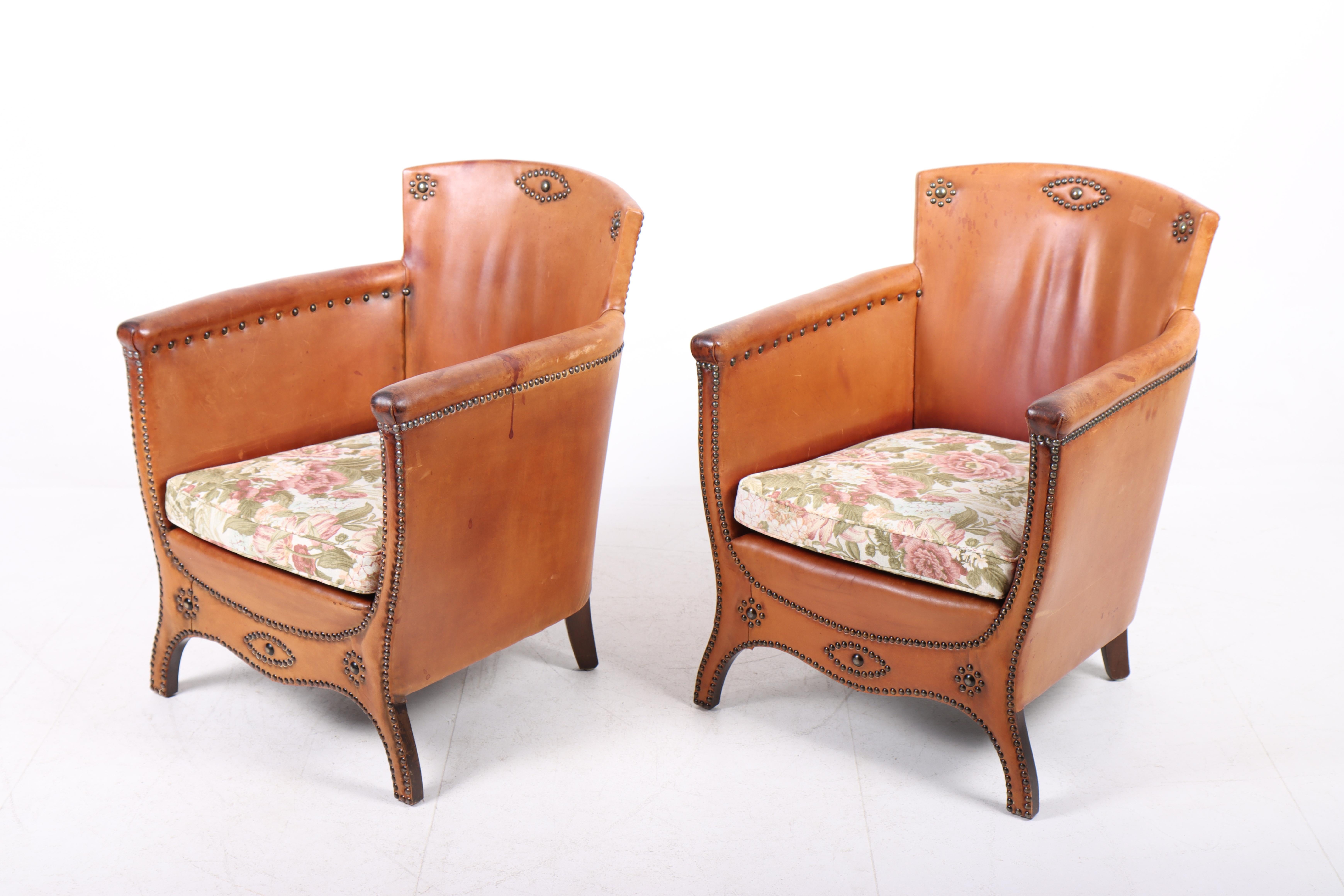 Swedish Pair of Lounge Chairs in Patinated Leather and Fabric, Designed by Otto Schulz