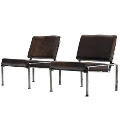 Pair of Lounge Chairs in Patinated Leather and Steel Frame