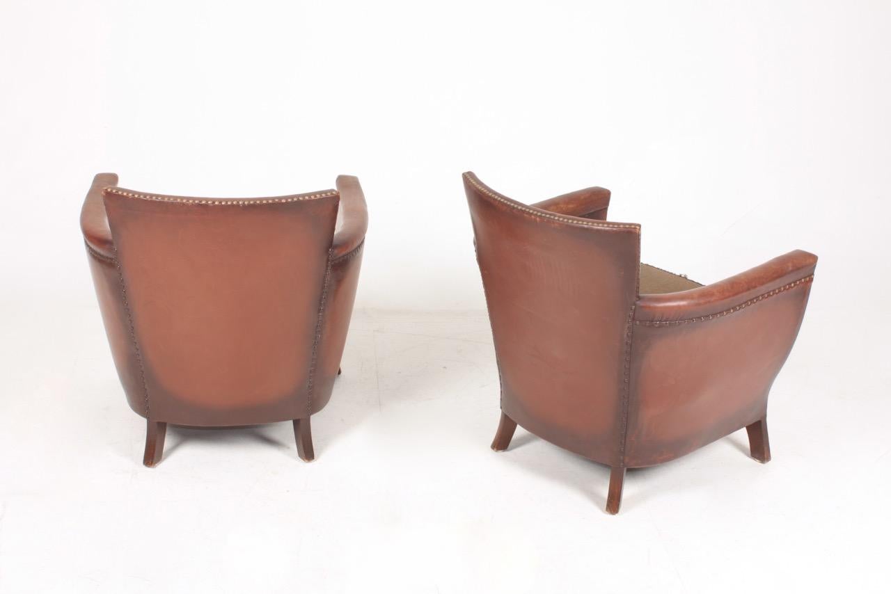 Pair of Lounge Chairs in Patinated Leather Designed by Otto Schulz 5