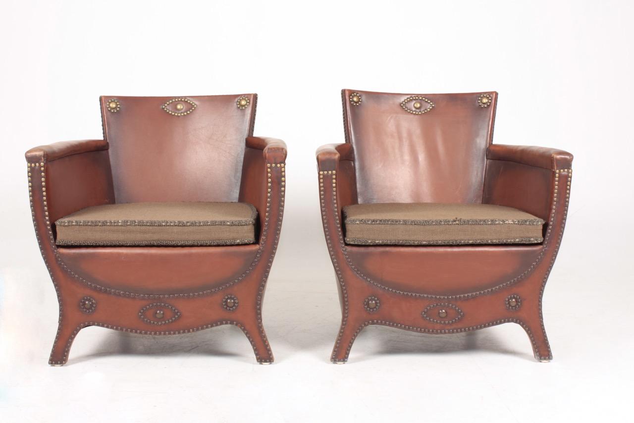Swedish Pair of Lounge Chairs in Patinated Leather Designed by Otto Schulz