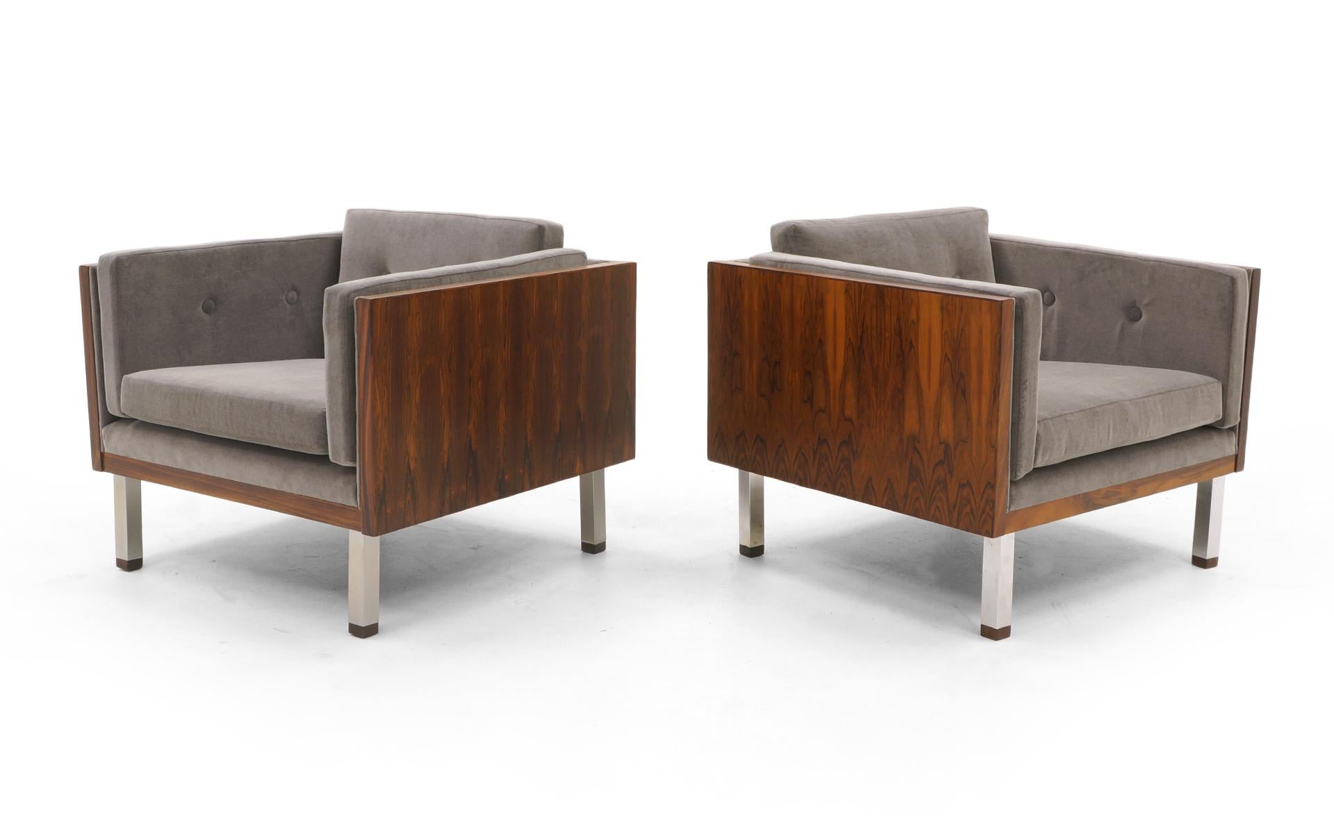 Pair of Danish Modern Rosewood case lounge chairs by Jydsk Møbelværk. Expertly refinished and reupholstered. We also have a pair of matching loveseats / settees and a full size matching sofa.