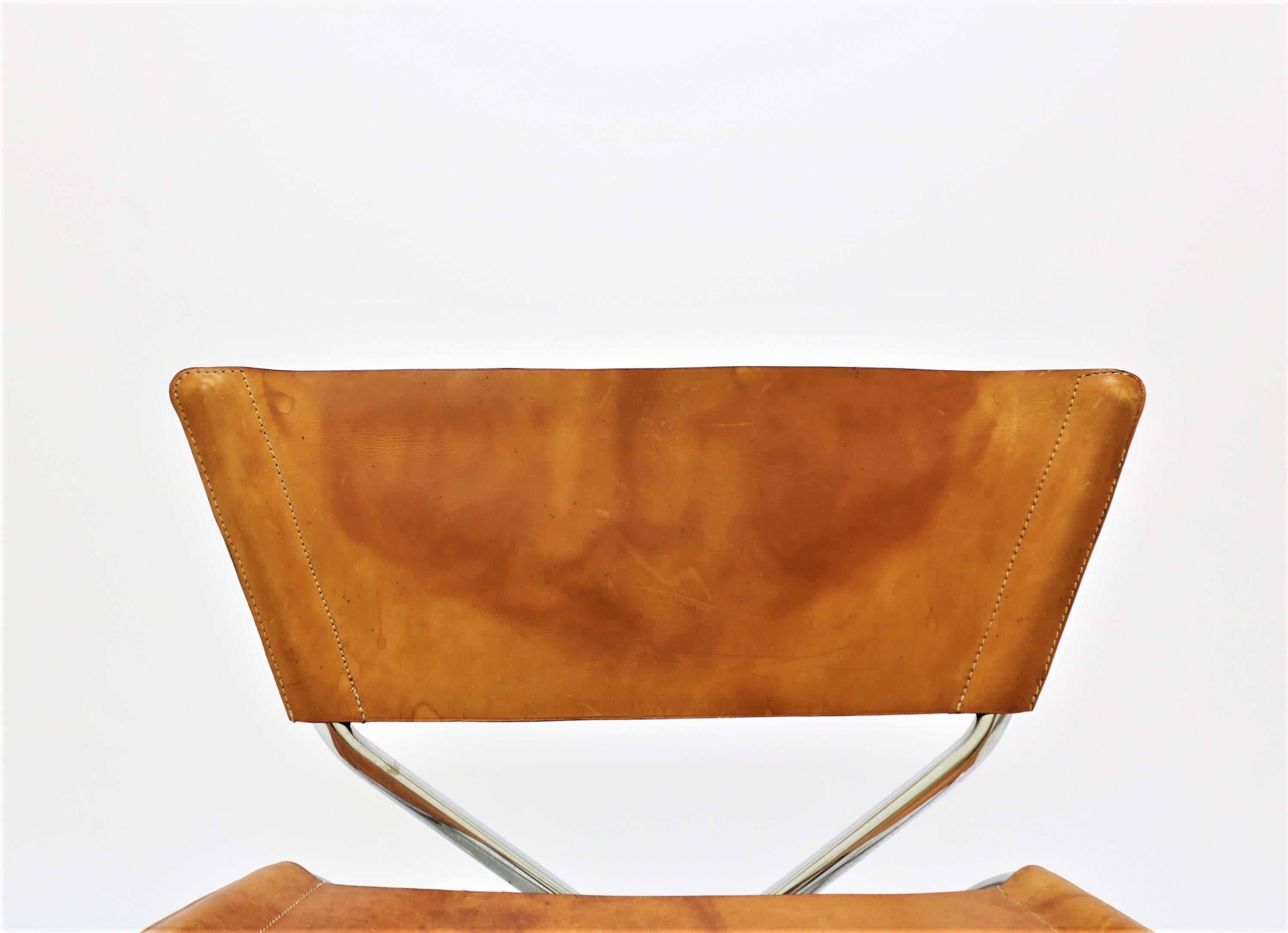 Mid-20th Century Pair of Lounge Chairs in Saddle Leather and Steel by Erik Magnussen, Denmark