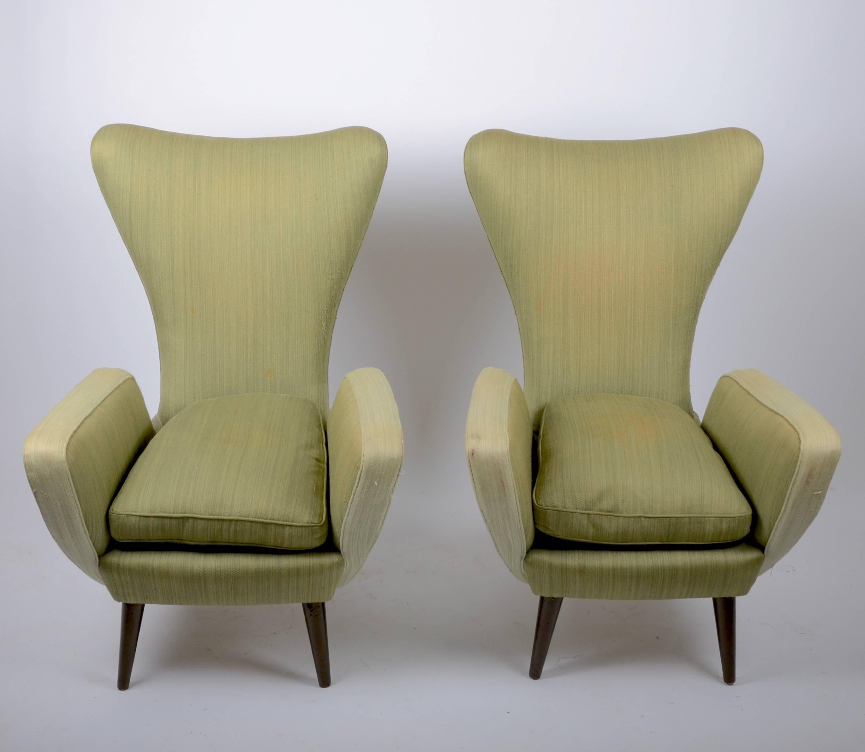 A pair of lounge chairs, Italian, 1950s. Wool fabric, in need of reupholstering.