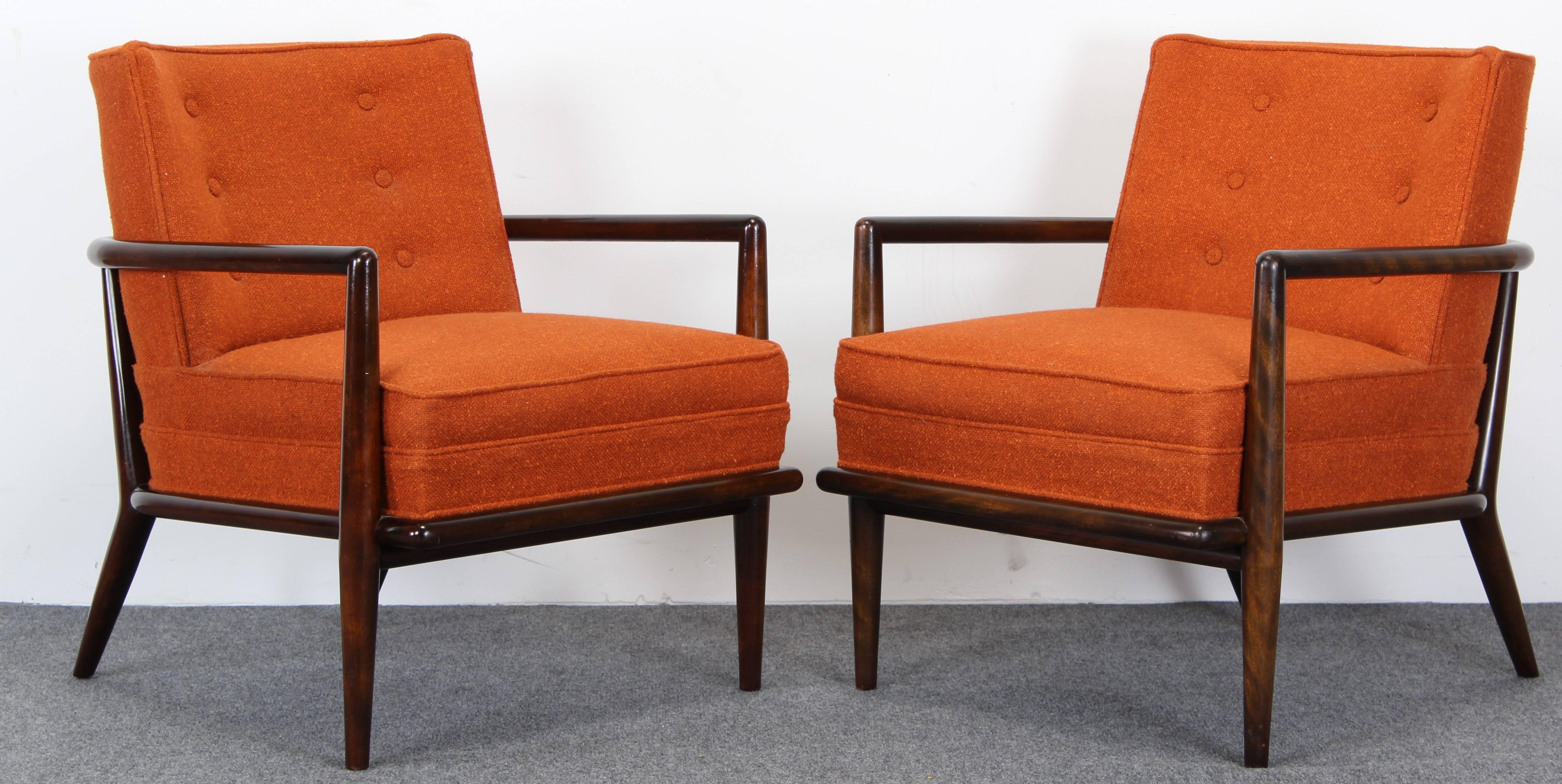 A rare pair of deep brown stained lounge (tub) chairs as shown in catalog, model number 1721, with possibly original upholstery designed by T.H. Robsjohn-Gibbings for Widdicomb. Labelled True Grand Rapids underside. Some minor scuffs to wood as