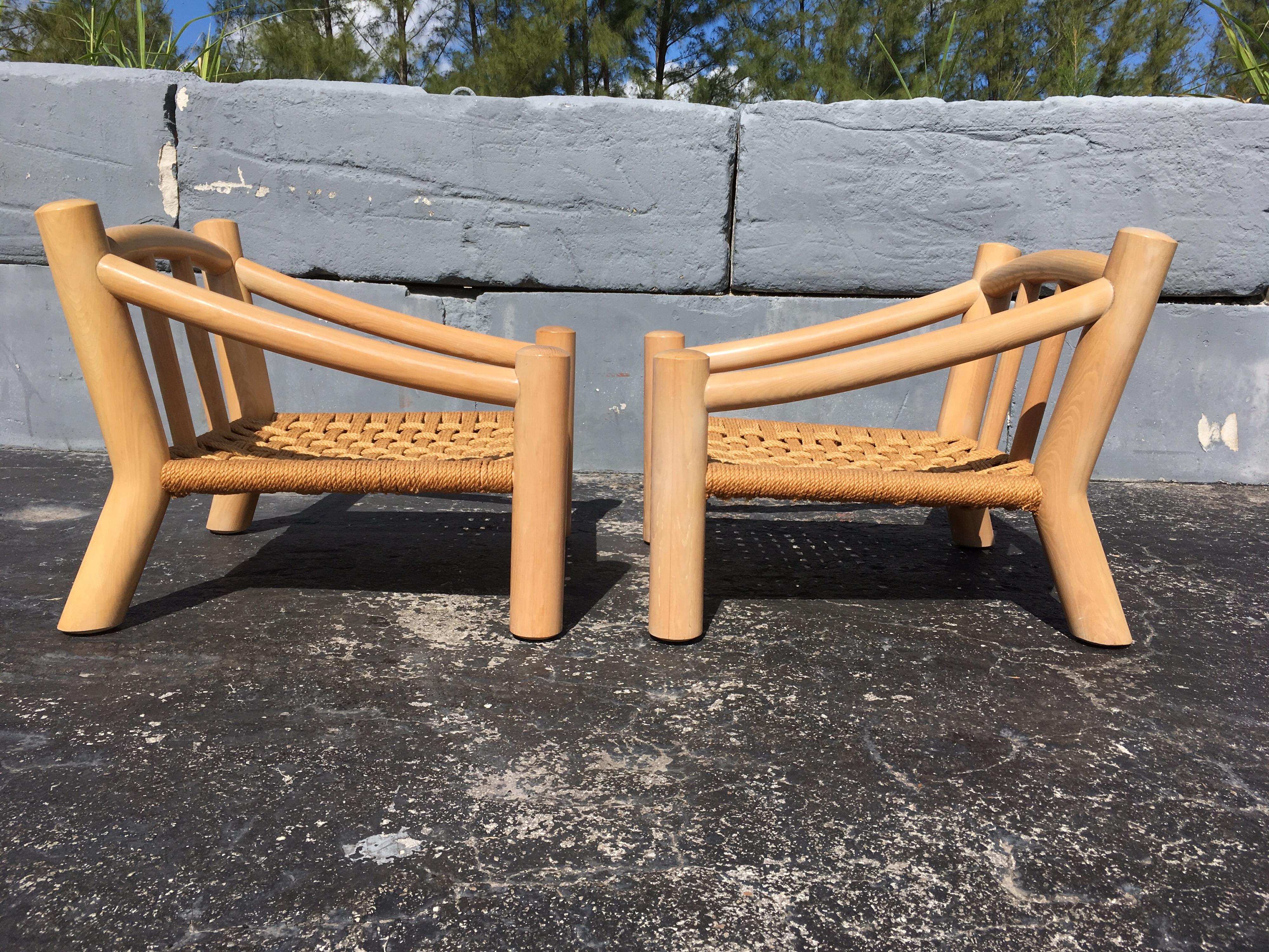 Beautiful massive solid wood lounge chairs with rope seats, each chair has a down filled seat and back cushion.
Cushions need new fabric. We can help.
Four chairs in total available. Seat height is with cushion.