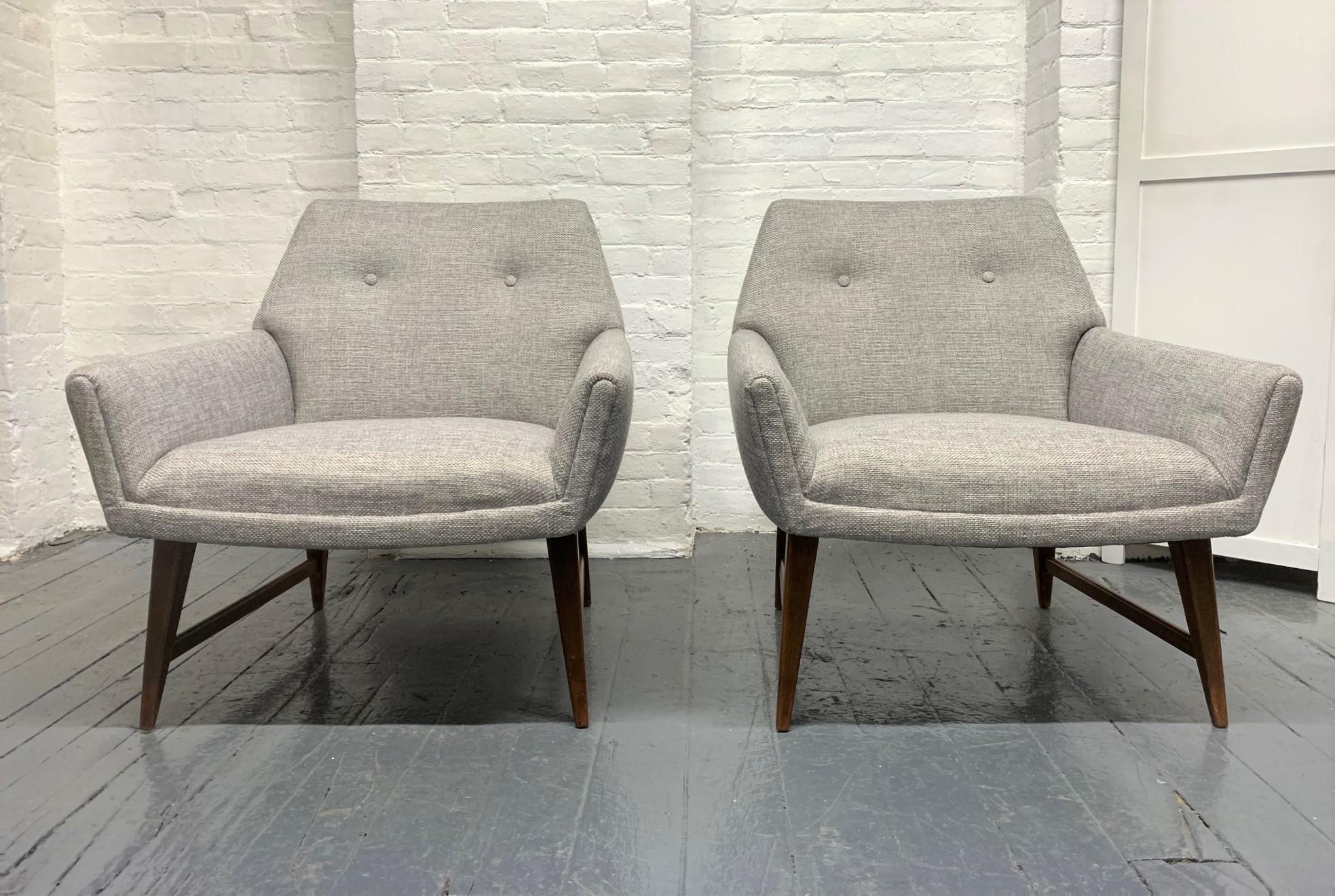 Pair of lounge chairs style of Raphael. Has solid walnut legs and newly reupholstered.