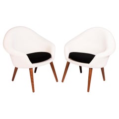 Pair of lounge chairs with seat cushions