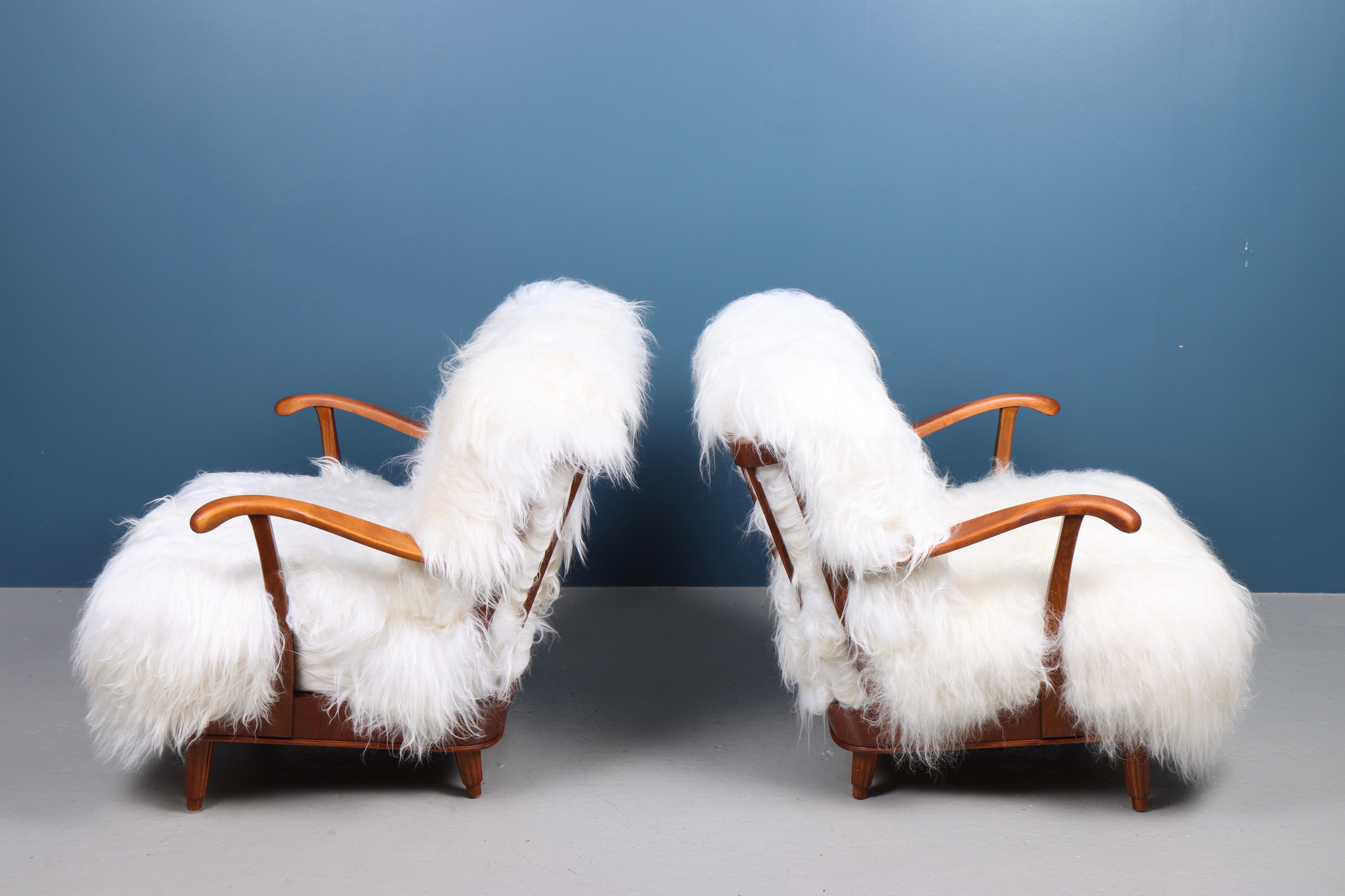 Pair of Lounge Chairs with Sheepskin, Made in Sweden 1950s In Good Condition In Lejre, DK