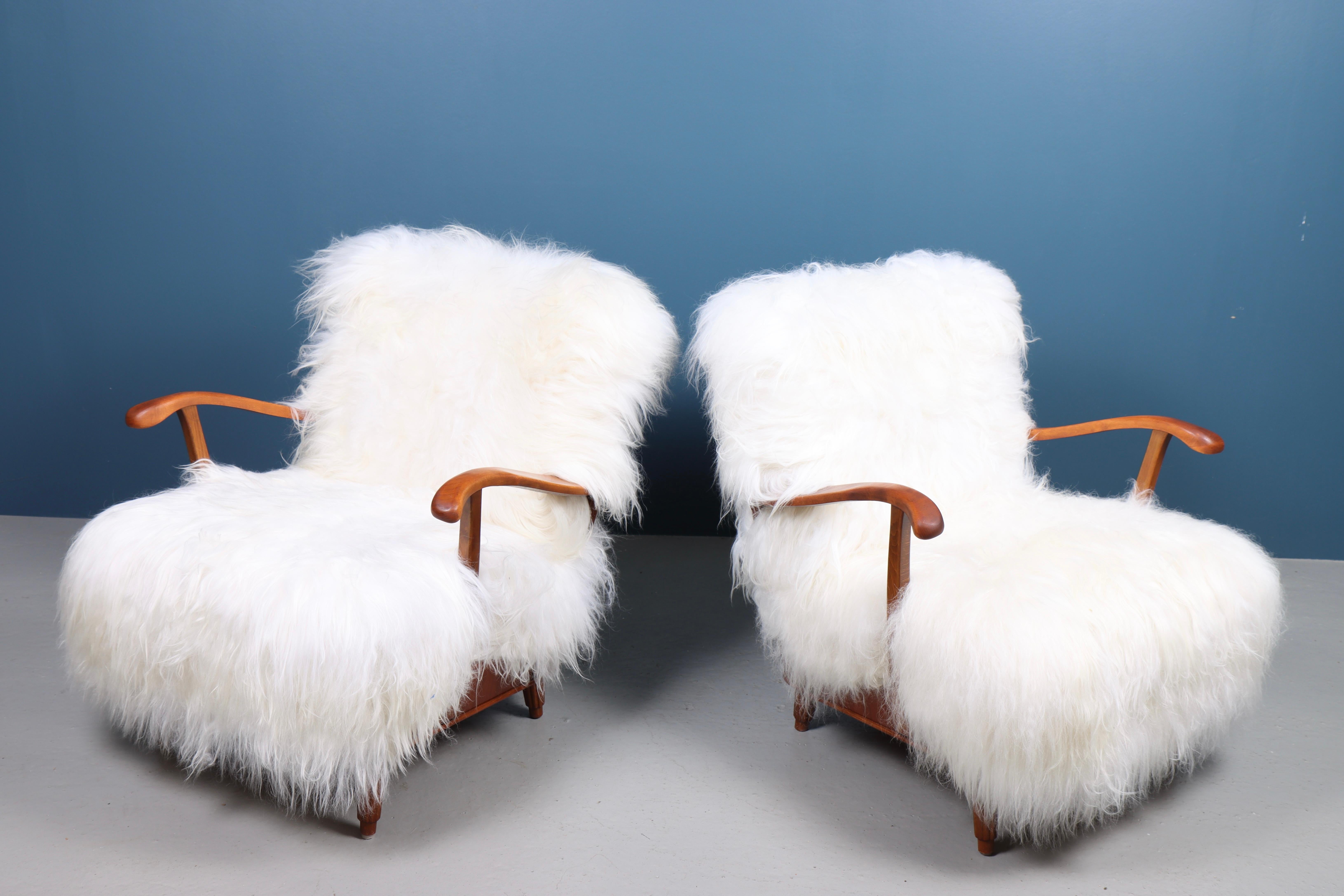 Mid-20th Century Pair of Lounge Chairs with Sheepskin, Made in Sweden 1950s