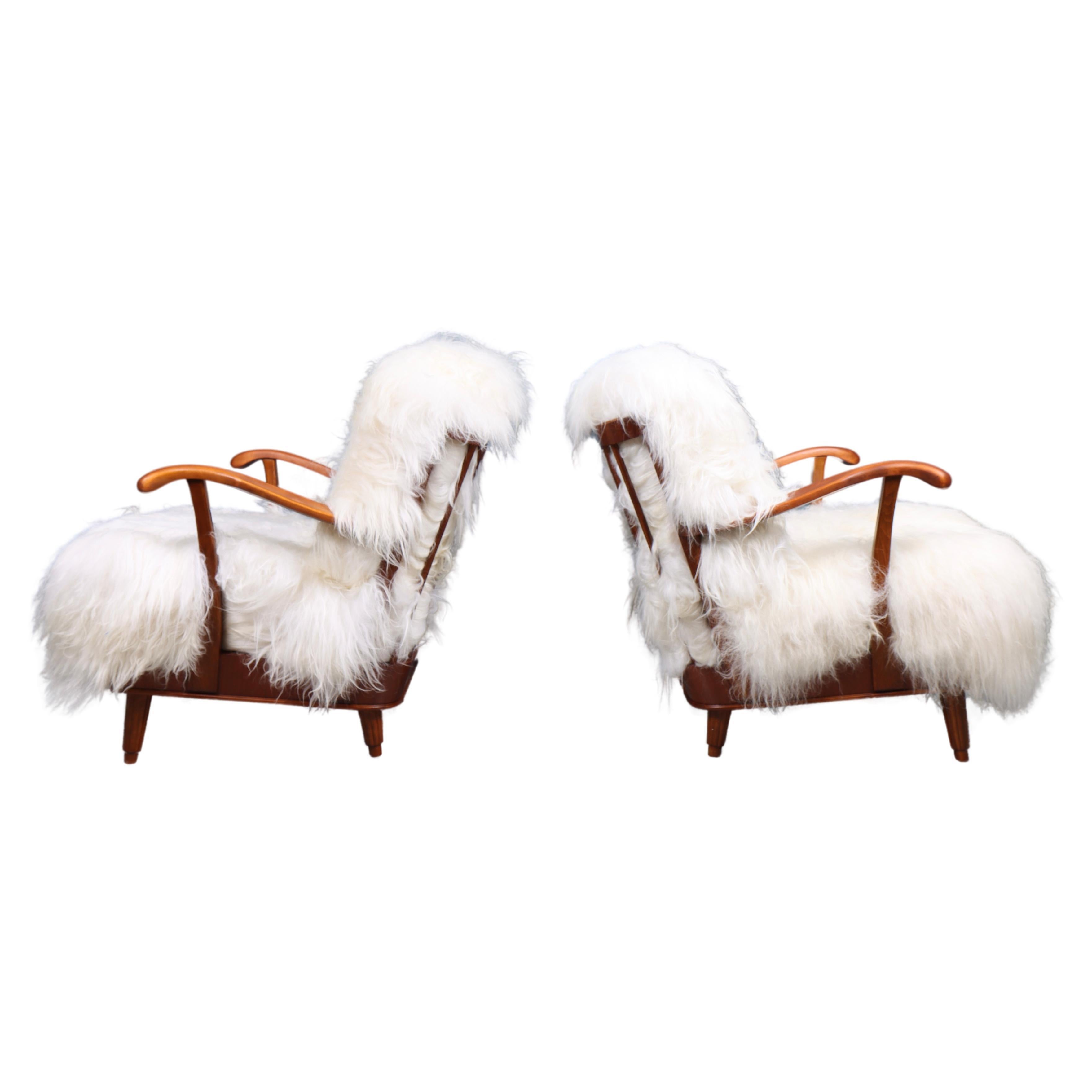 Pair of Lounge Chairs with Sheepskin, Made in Sweden 1950s