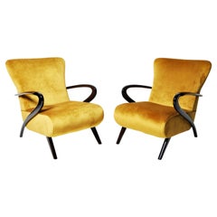 Pair of Lounge Chairs with Solid Walnut Arms