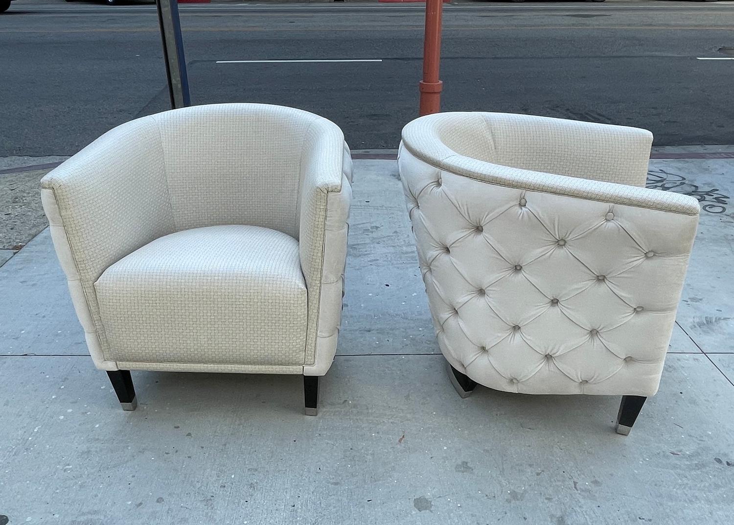 Introducing the Pair of Lounge Chairs with Tufted Backs by Luxury Living, the perfect addition to any indoor space. These chairs are designed to offer both comfort and style, making them ideal for relaxing on a warm summer day or enjoying a cool