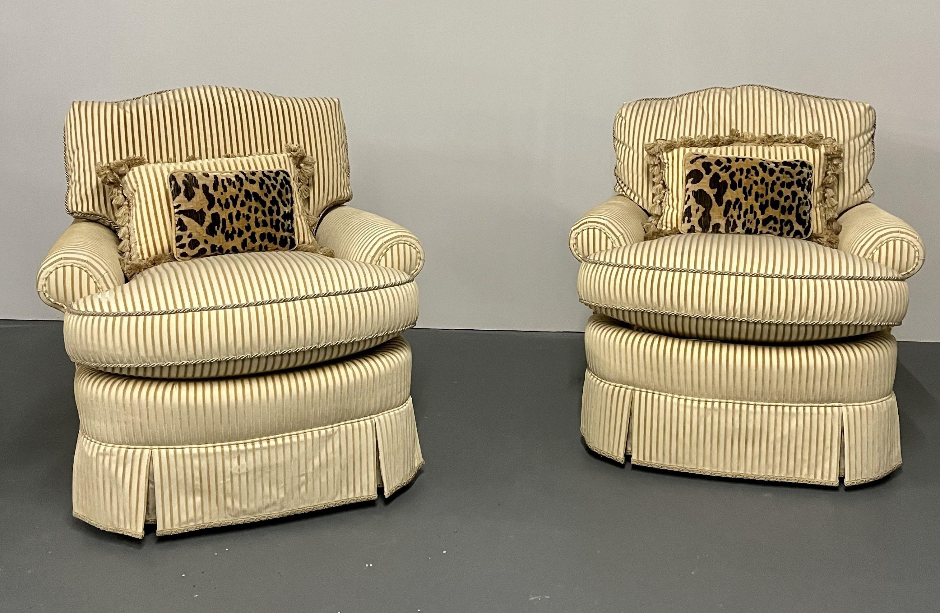 Pair of lounge chairs, dapha, finely upholstered. The pair supported on four legs in a wonderful upholstery with a rope multi color welt and custom pillows.

Seat height: 21 in.

Several photographs shot directly from Dr. Shawn Garber's home on