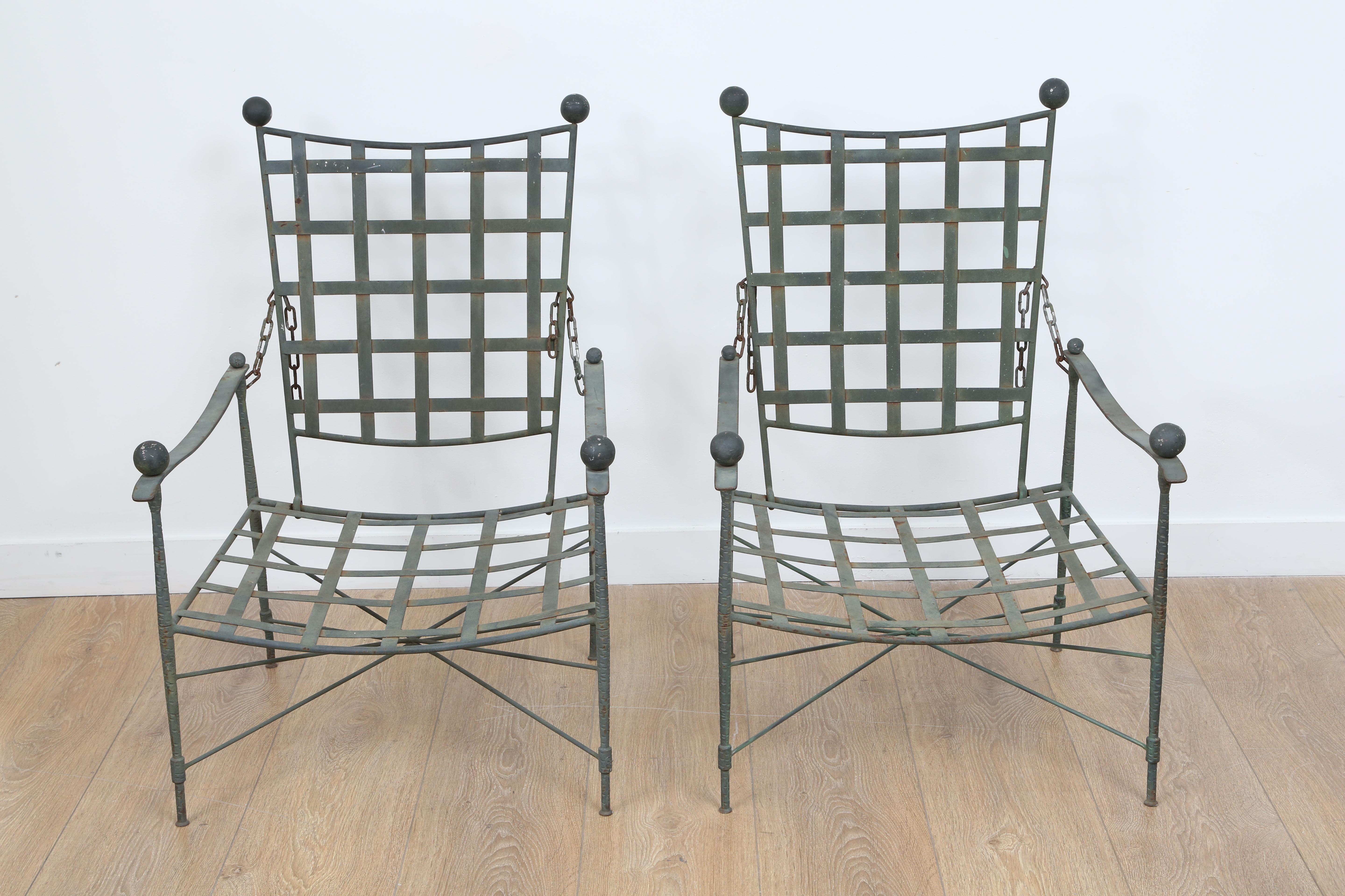Pair of vintage adjustable lounge patio chairs, 1 ottoman and 1 side (not shown) table by Mario Papperzini for Salterini.
Upholstery per your own specification by our local artisan, 5 yards each chairs, 2 yards for the ottoman. Upholstery not