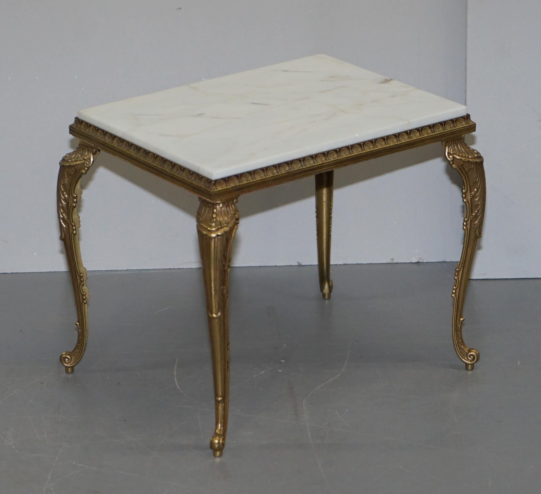 We are delighted to offer for sale this lovely pair of original circa 1900 French brass side tables with Italian Carrera marble tops

A very good looking well made and decorative pair, the frames are brass with a bronzed finish, the tops are hand