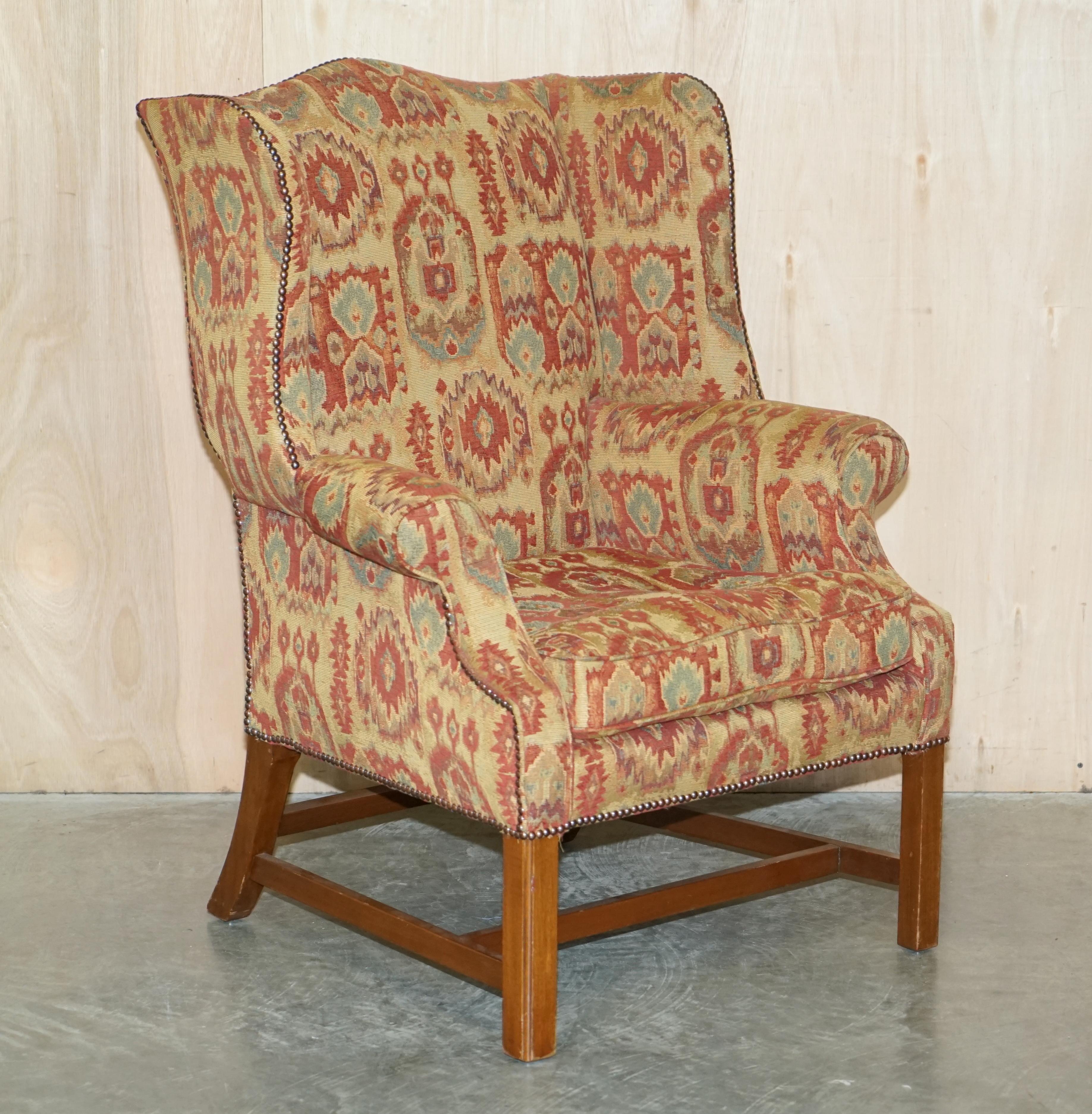 We are delighted to offer for sale this stunning pair of Kilim fabric upholstered wingback armchairs in lovely condition throughout.

A well-made and decorative pair of armchairs which are very comfortable, the upholstery is Kilim as mentioned