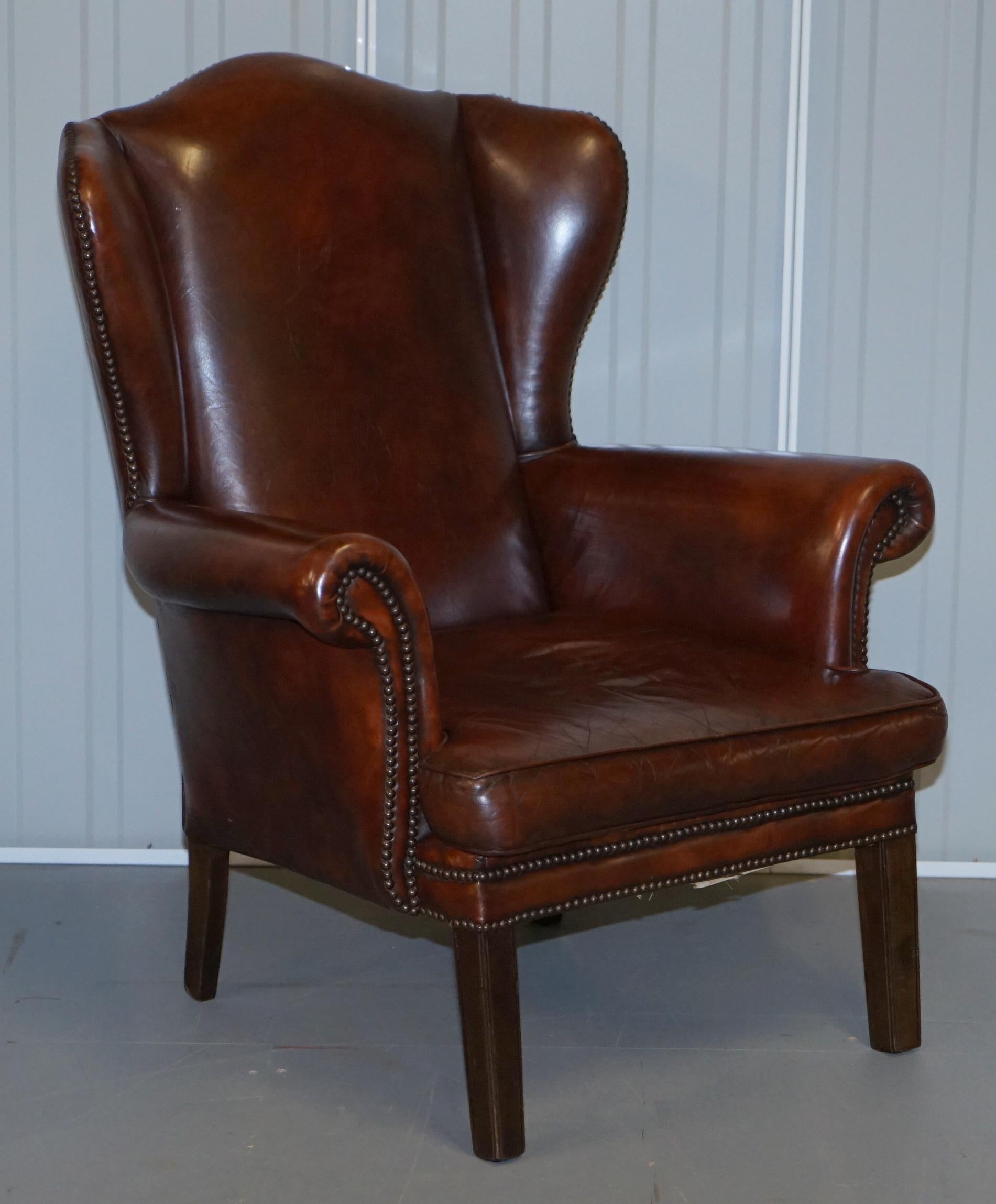 We are delighted to offer for sale this stunning pair of Vintage hand dyed brown leather wingback armchairs with rare laid back frames

I have never seen another pair of wingback armchairs with this shape frame before, normal wingbacks are