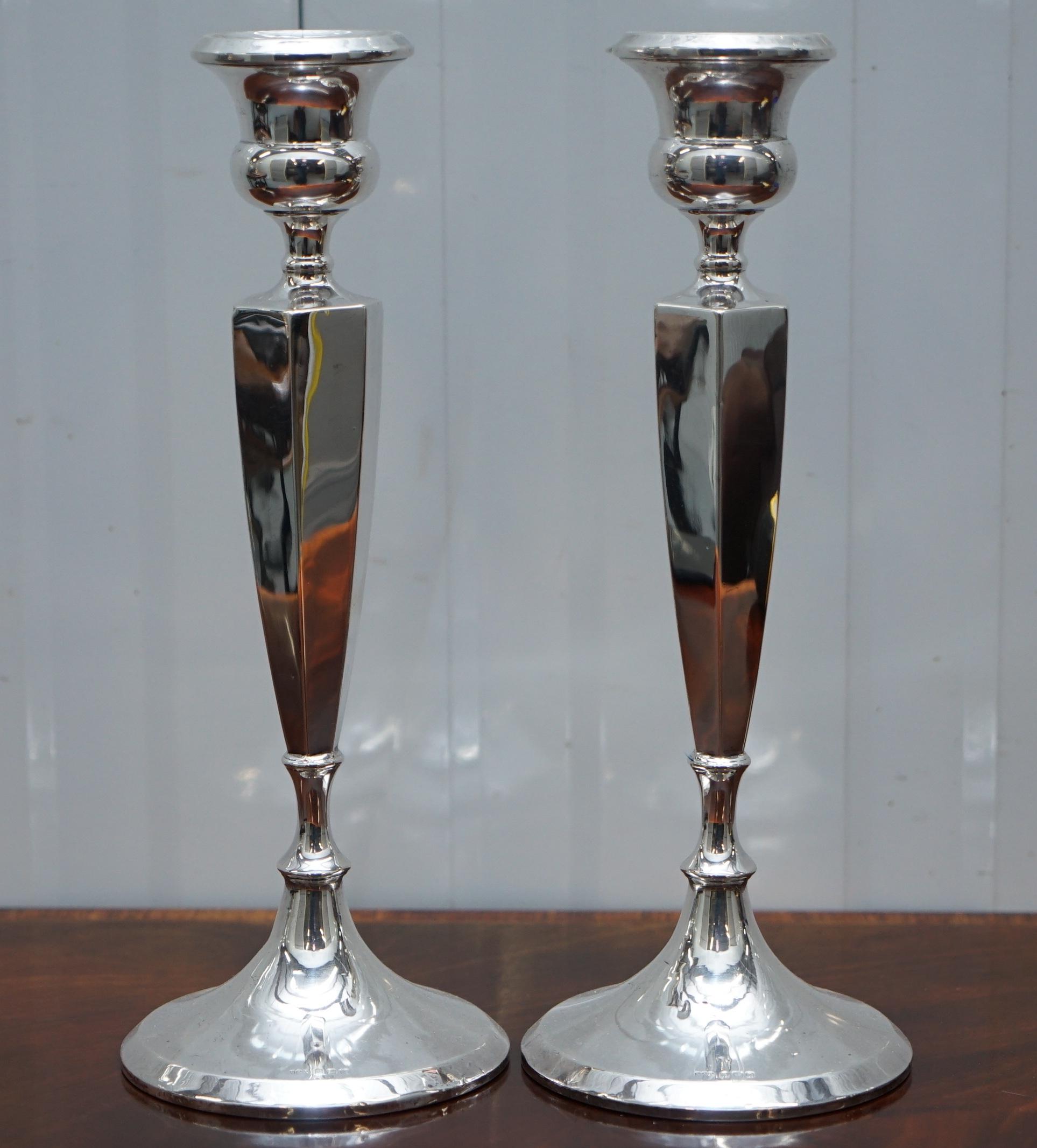 We are delighted to offer for sale this lovely pair of King George V Sterling silver candlesticks, 1920

A nice decorative pair, very tall and elegant Birmingham made and very elegant

Date letter V for 1920

The ships anchor for